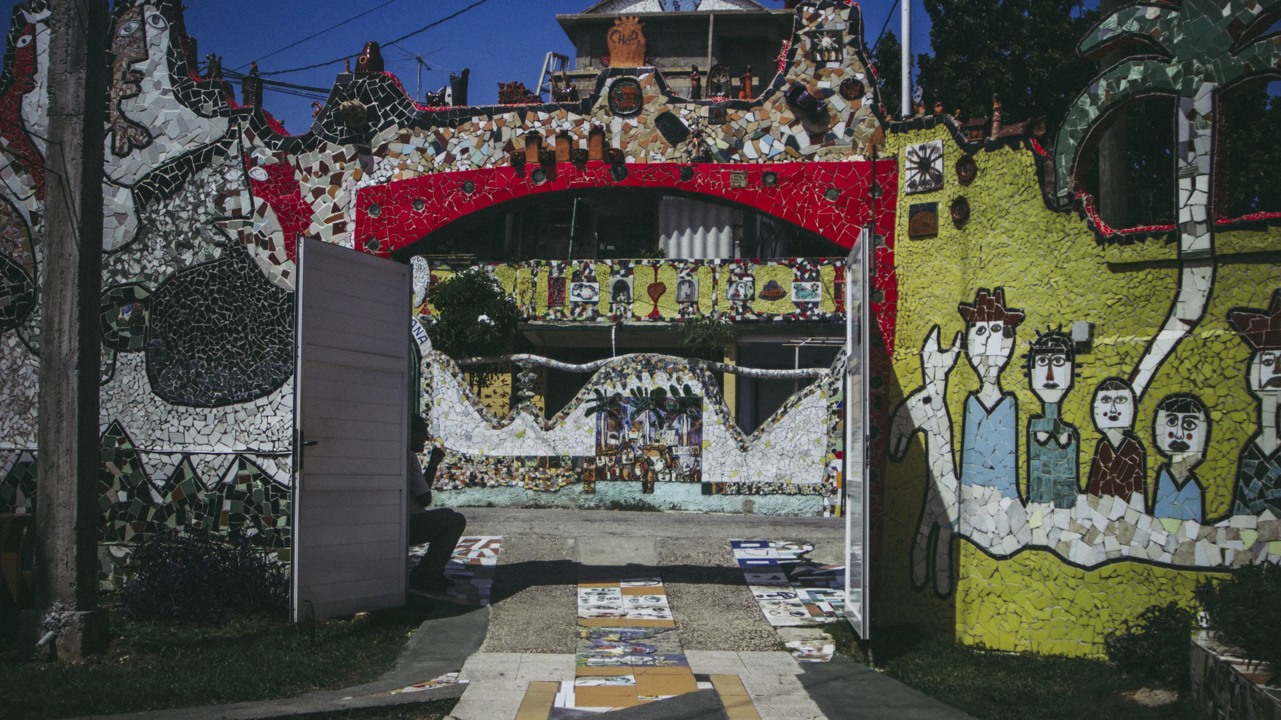 -Luis sits at the gate of Fusterlandia.