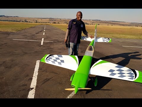 Sam Lusenga with his green Extra 330 at IRF 2017 (720HD)
