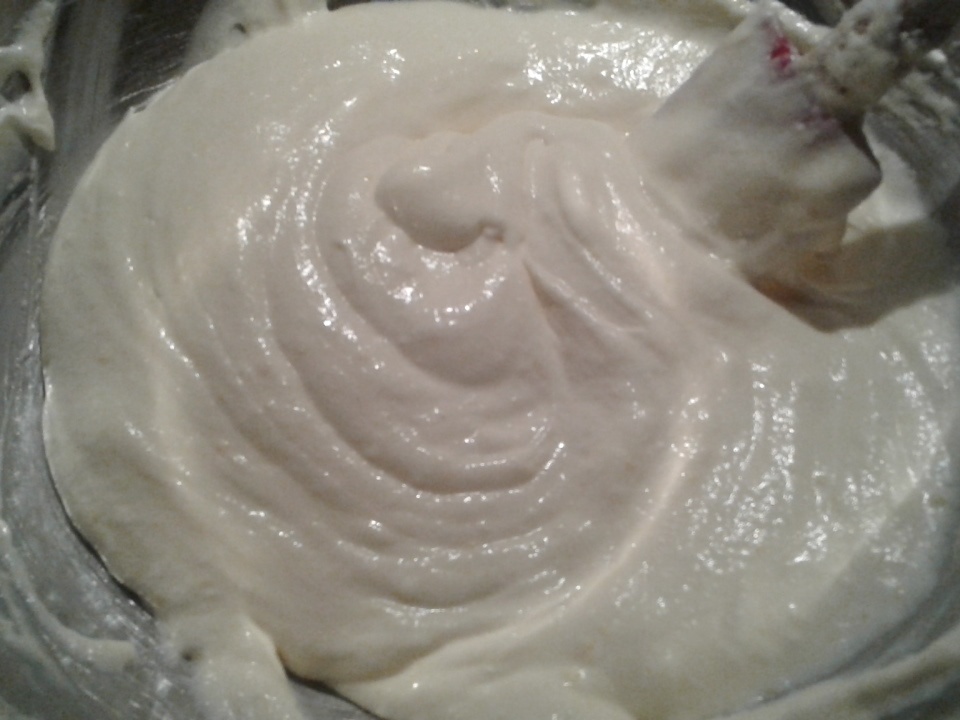 Beaten egg whites combined with mascarpone and egg yolk-sugar mixture.