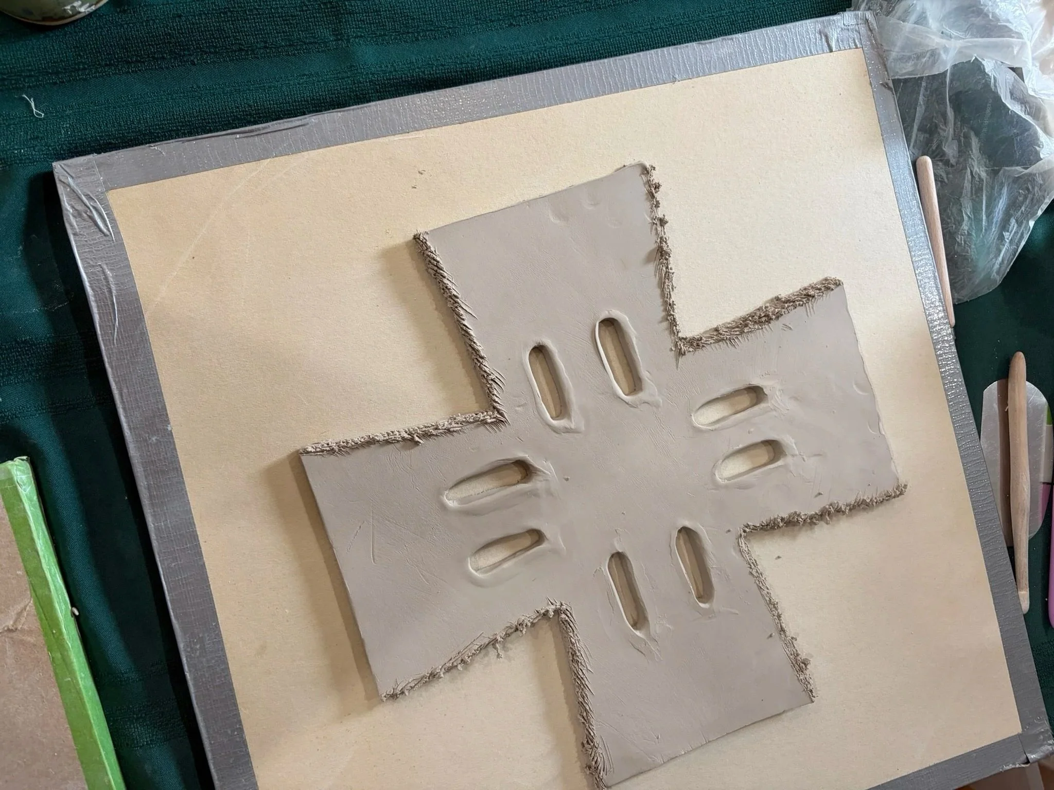 A clay berry basket, before it was formed into its final shape