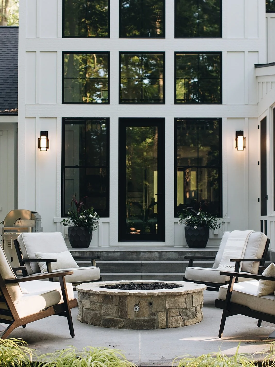 Firepit Design 
At nearly every lake home we design, a firepit becomes a must-have. Sometimes it hugs the house, creating a stunning focal point from indoors. Other times, it&rsquo;s its own destination&mdash;tucked away, private, and perfect for lat