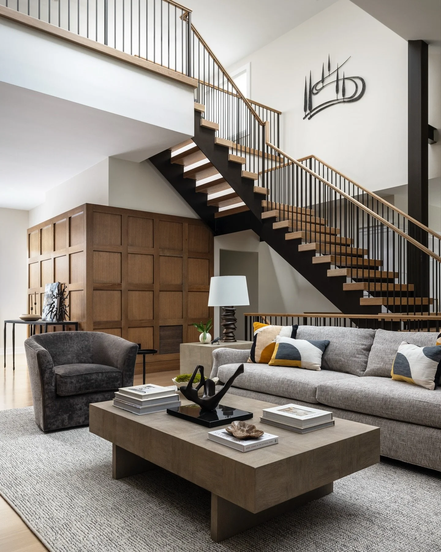 A few initial pictures of our #bhcoaklandhillsgolfdreams project. A former ranch, this now three level home is connected by this beautiful custom staircase. 

The voluminous space called for another strong element to add warmth and balance to the str