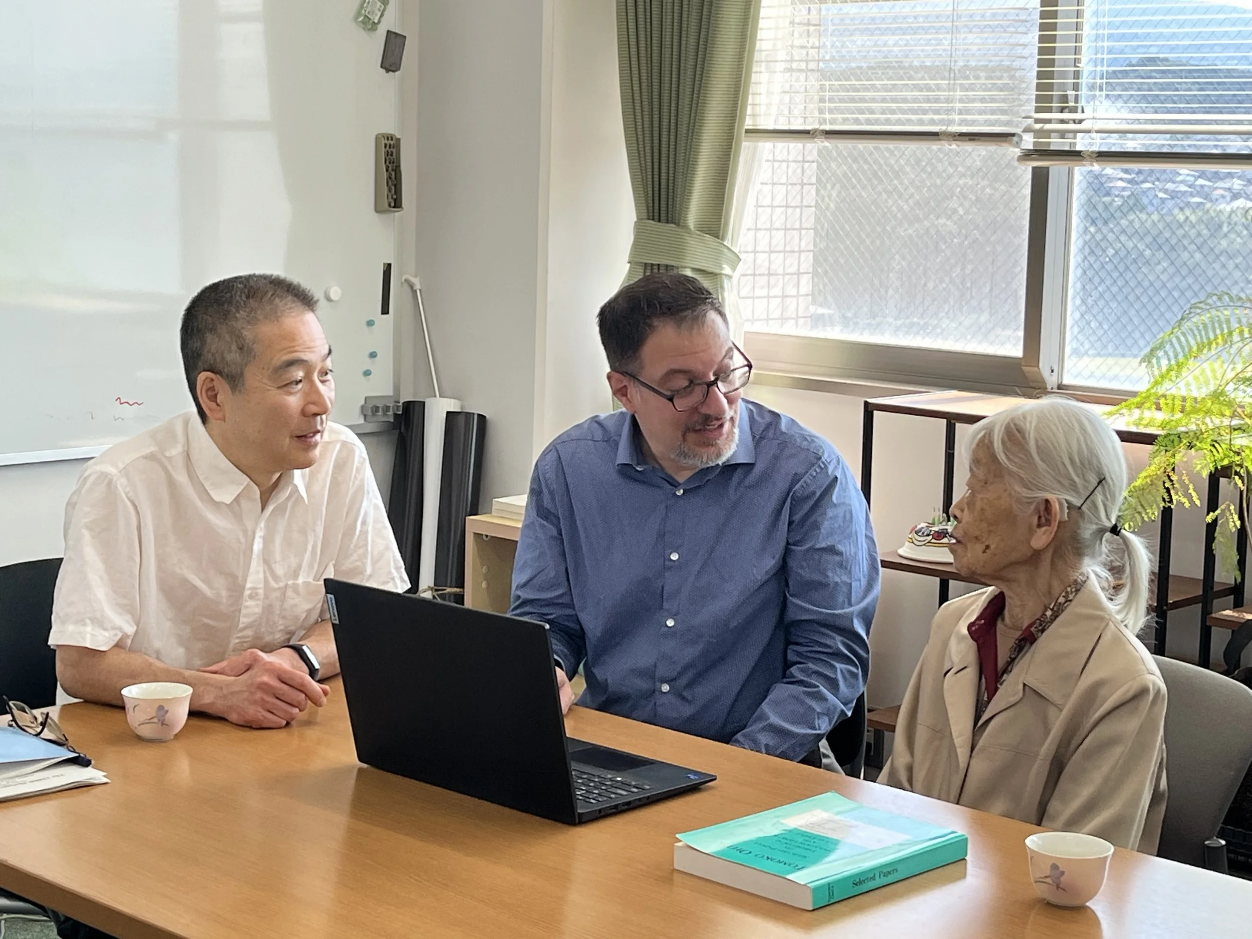 Alex with Hiroshi Akashi and Tomoko Ohta at the NIG in Mishima Japan.
