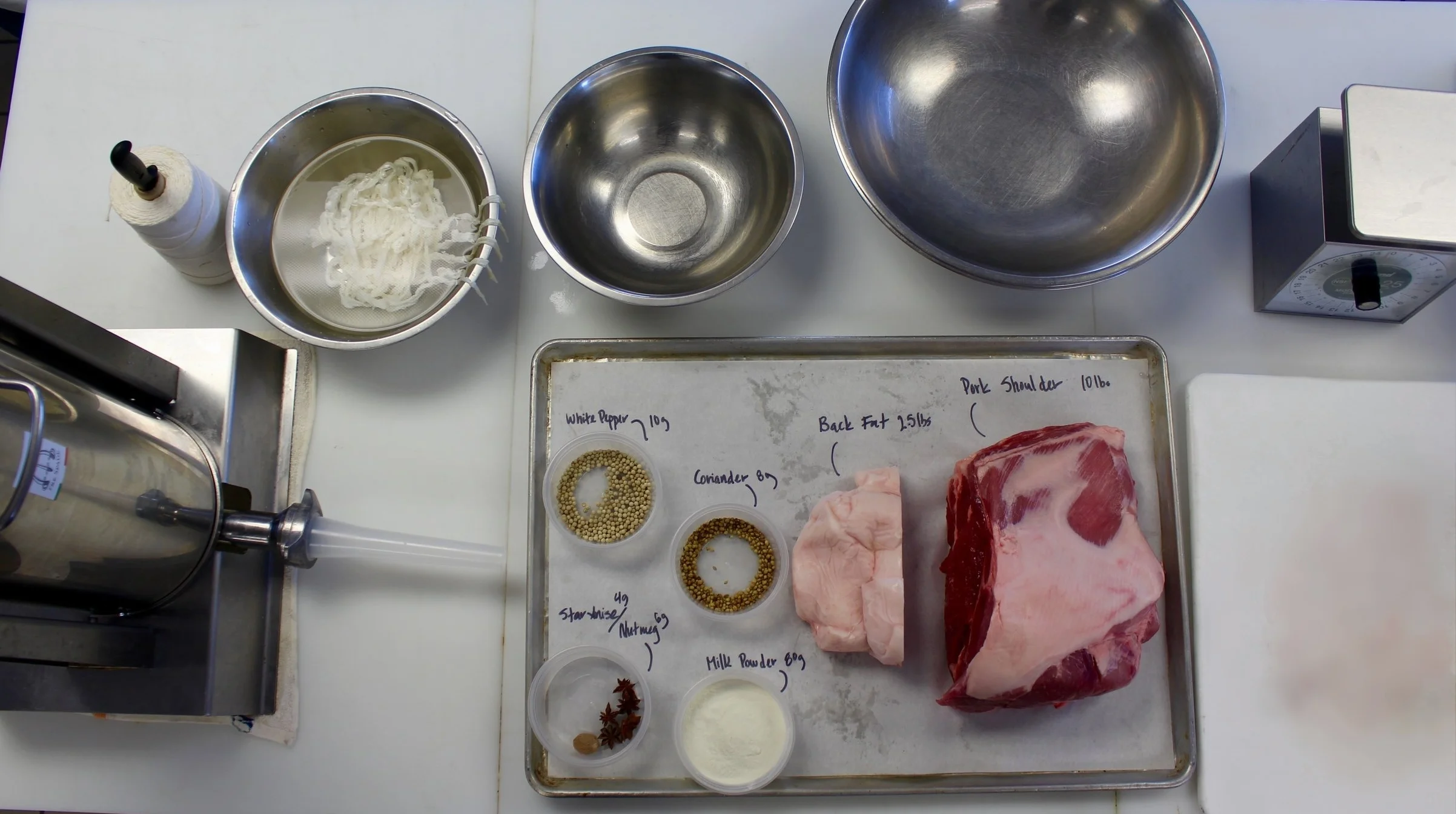 Tools: scale, meat grinder, large bowl, sausage stuffer, probe thermometer (Grinder and stuffer attachments available for KitchenAid and Cuisinart stand mixers; small stand-alone grinders and stuffers can be purchased for less than $100.)
