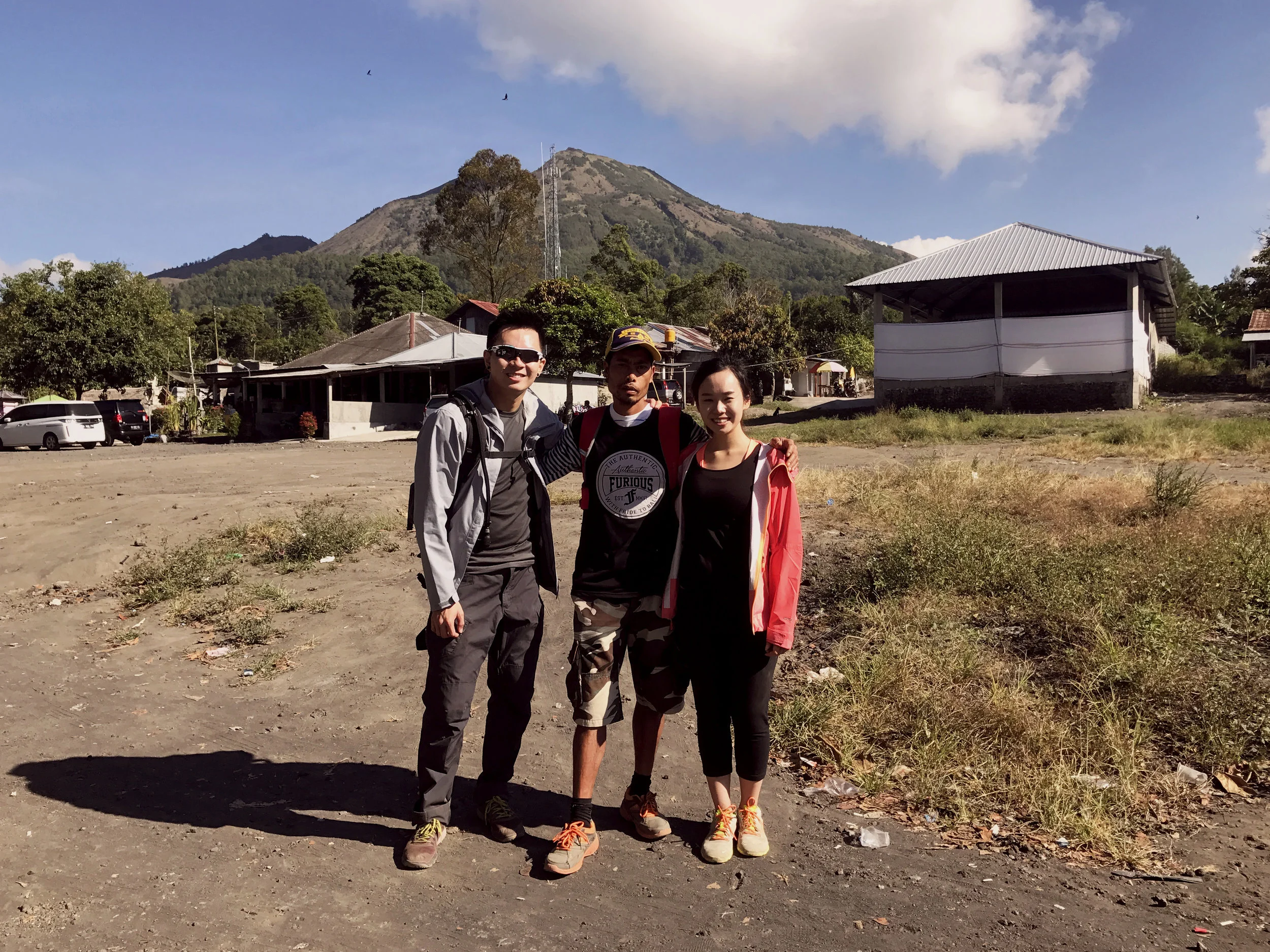With our guide, Ricky at the base of Mount Batur at the end of our tour.