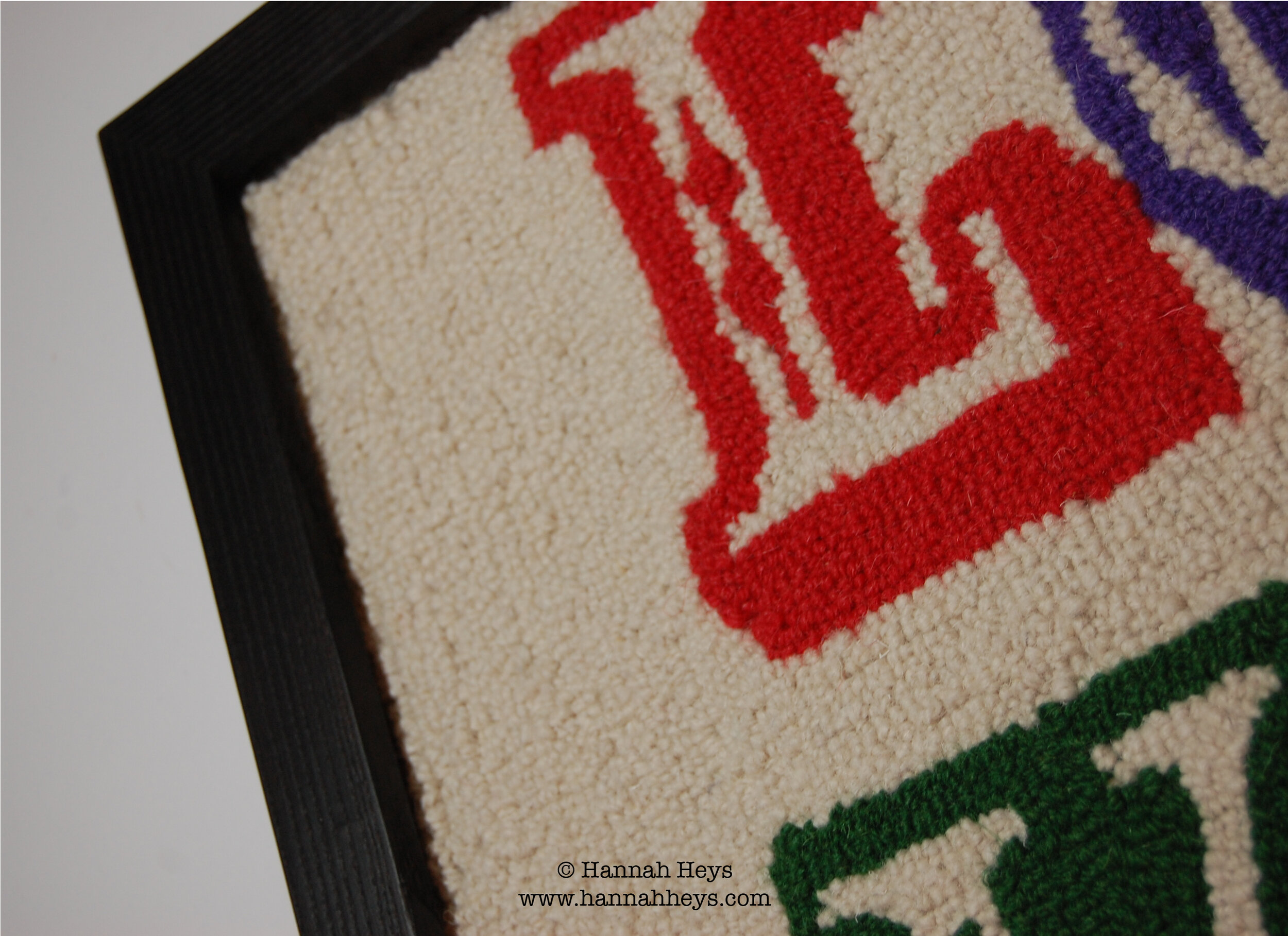 CLOSE UP OF RUG TUFTED PIECE - SCROLLING SERIES