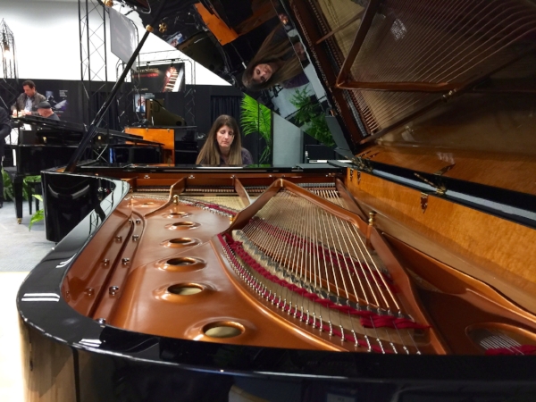 Playing a Shigeru Kawai Concert Grand. Man this thing has such beautiful tone and I loved the action. Photo by Jon Whitledge