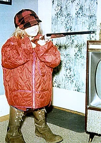 Mary VanVeghten in dad's hunting clothes