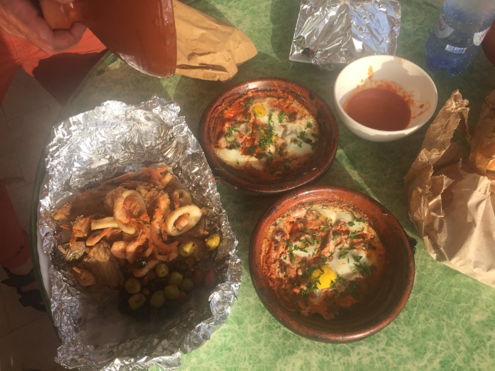 Takeaway, Moroccan style. No disposable dishes here—we returned the clay tagines the next day.