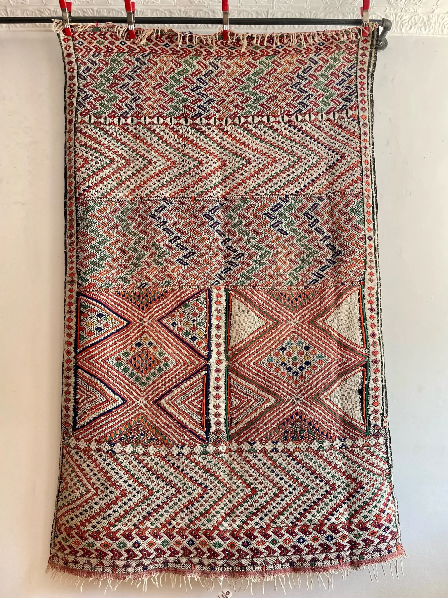 multicolor vintage Zaiane  Moroccan kilim rug with blue, neon orange, cream and green