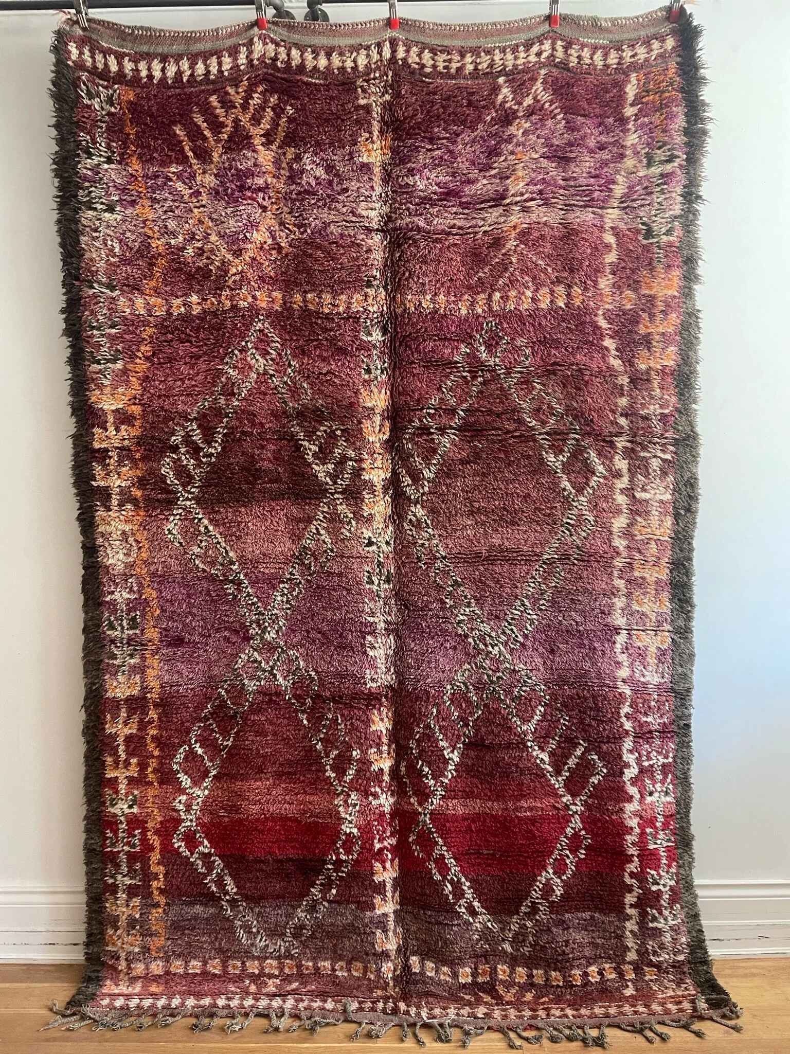 purple vintage moroccan wool rug with large diamonds and brown border