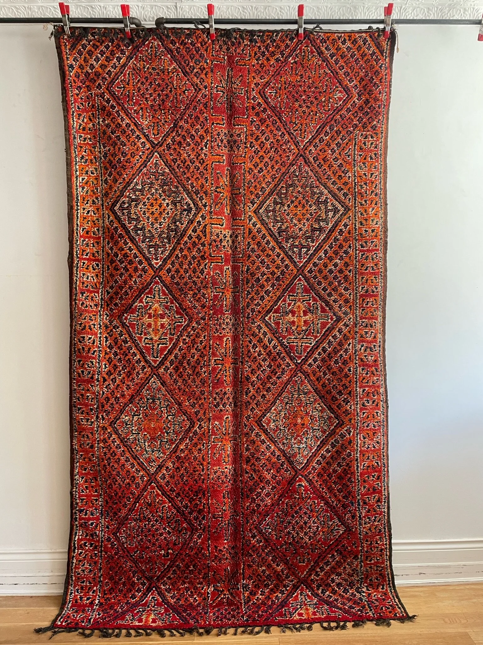 Vintage red Moroccan Beni Mguild rug with diamonds and blue indigo yarn