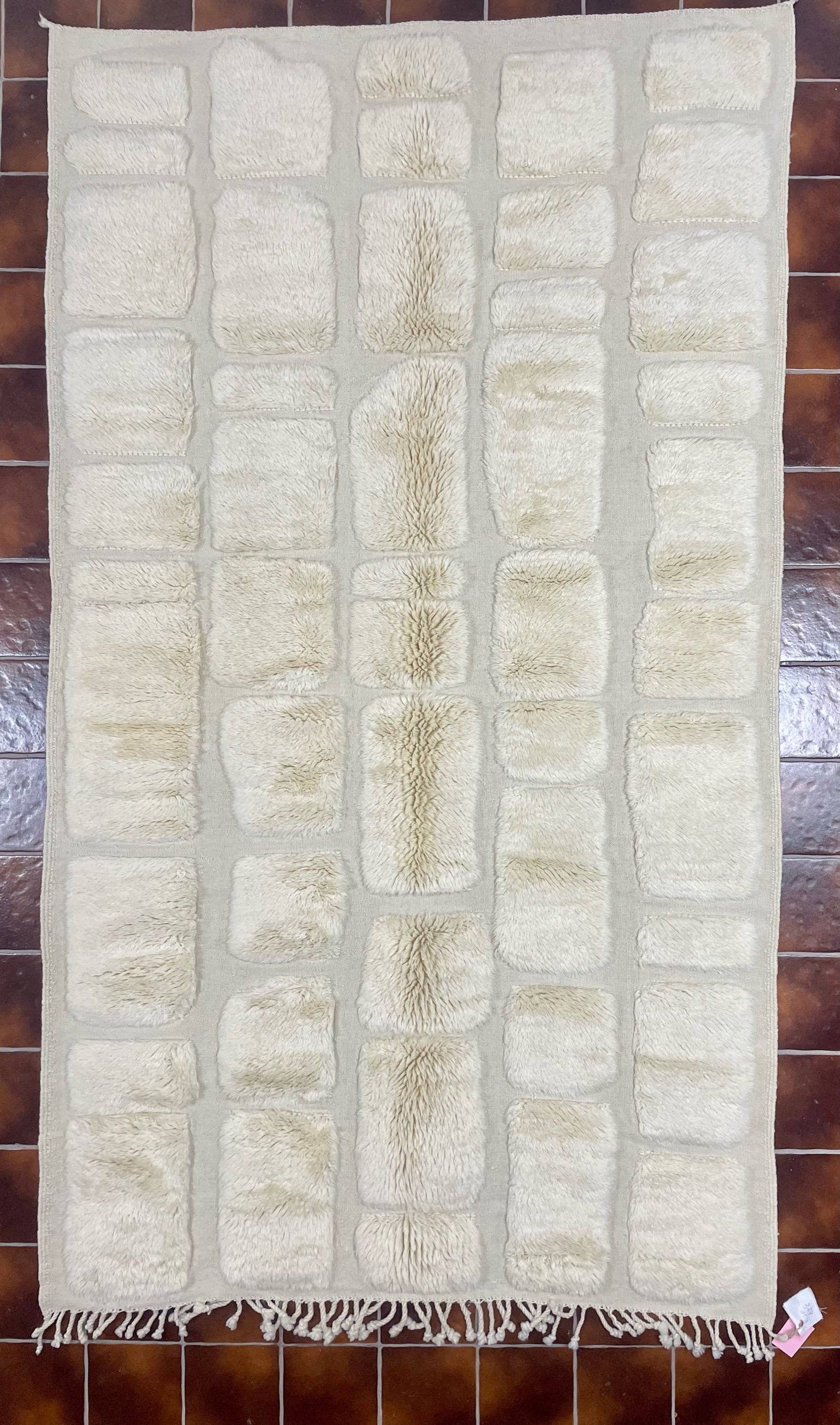 cream morocan wool rug with mix of cut pile and kilim creating a cobblestone look