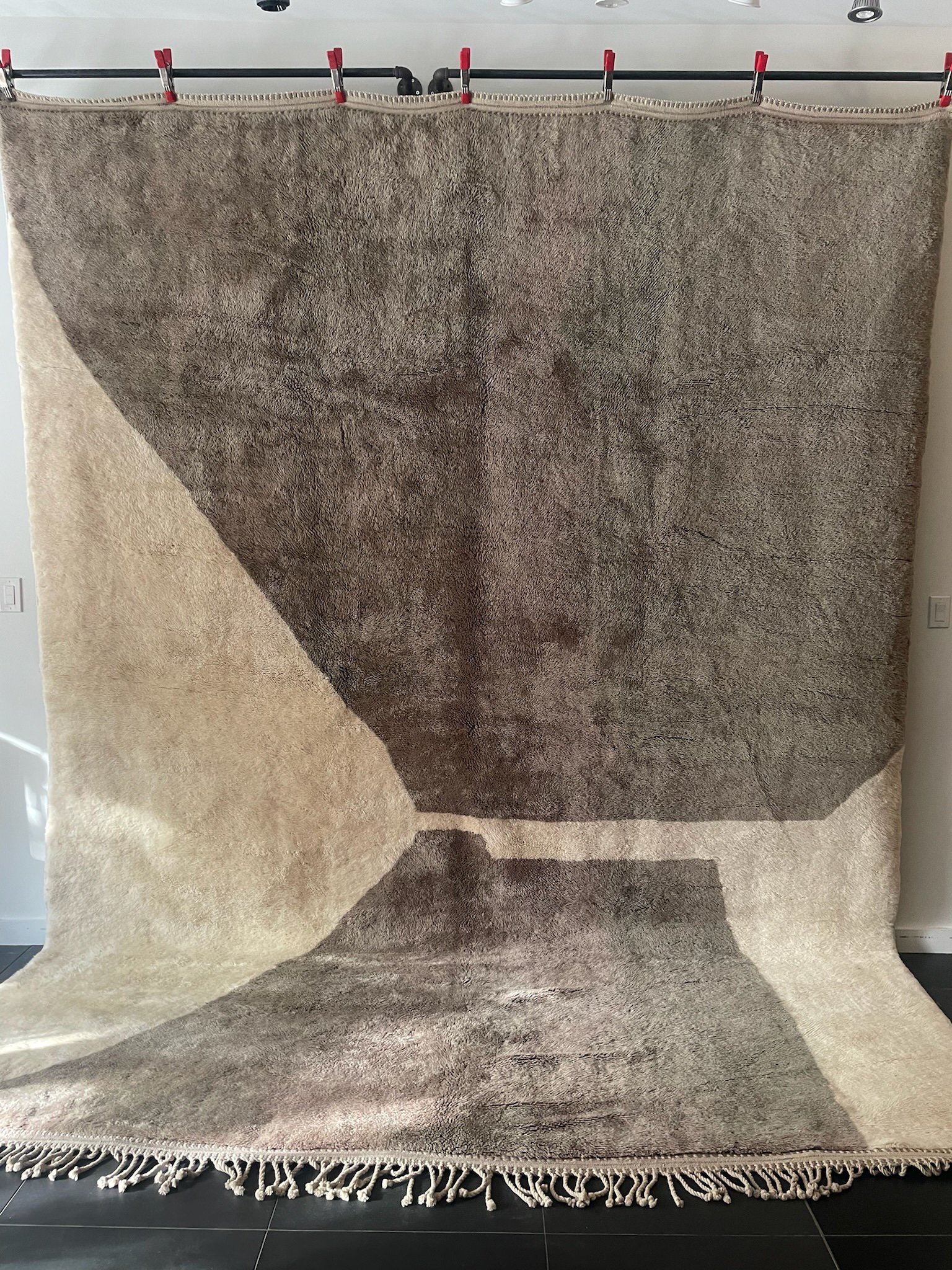 Oversize neutral cream and light brown hand-knotted Moroccan wool rug