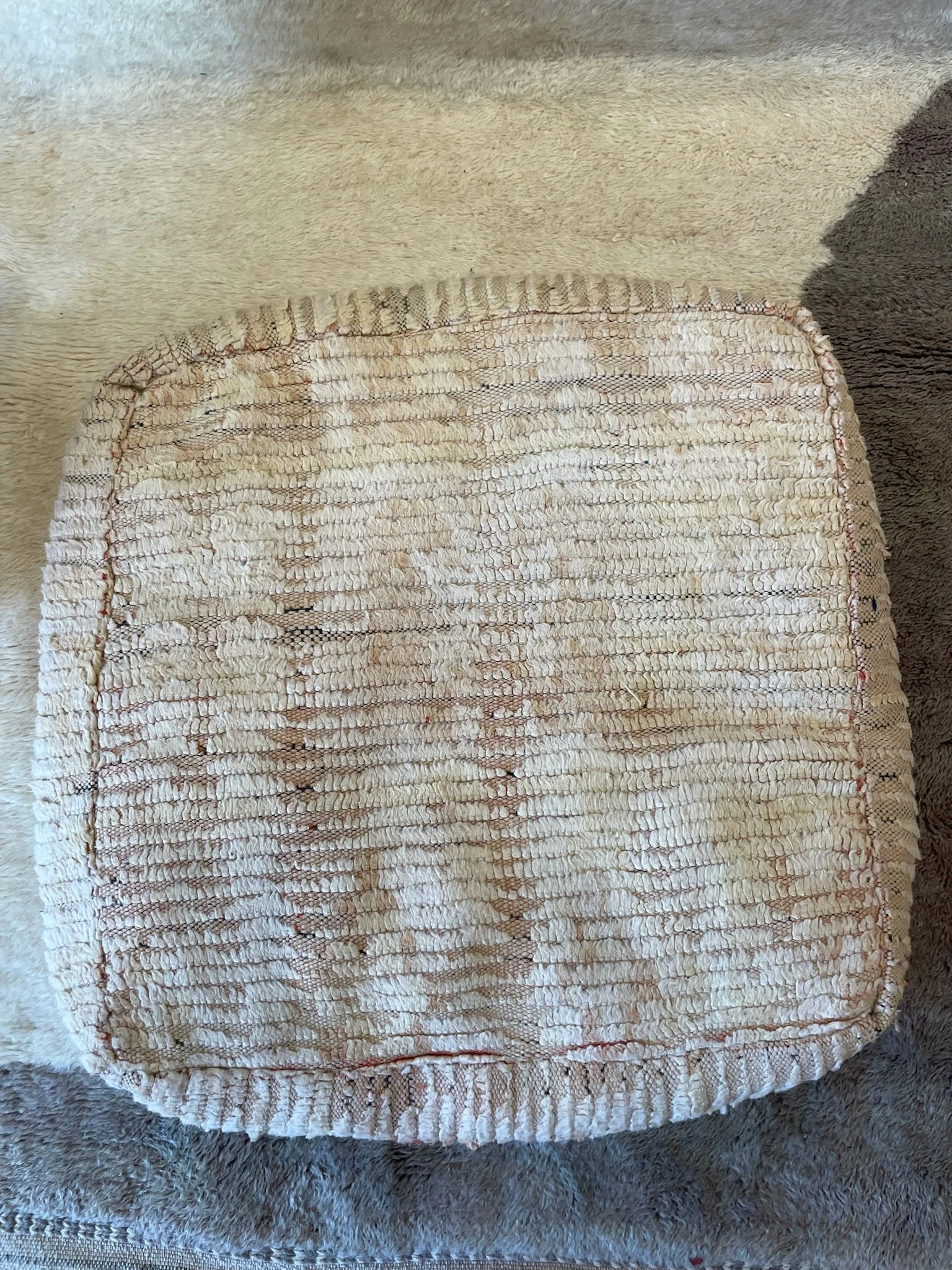 Pale pink Moroccan floor cushion with stuffing