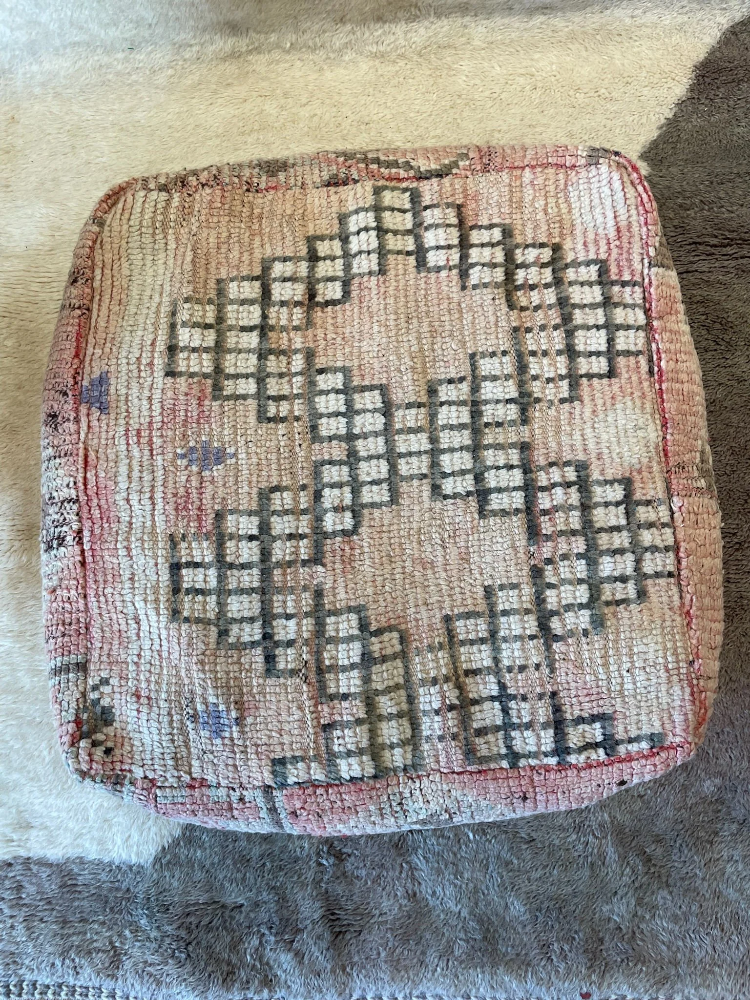 Soft pink Moroccan floor cushion with brown and cream designs