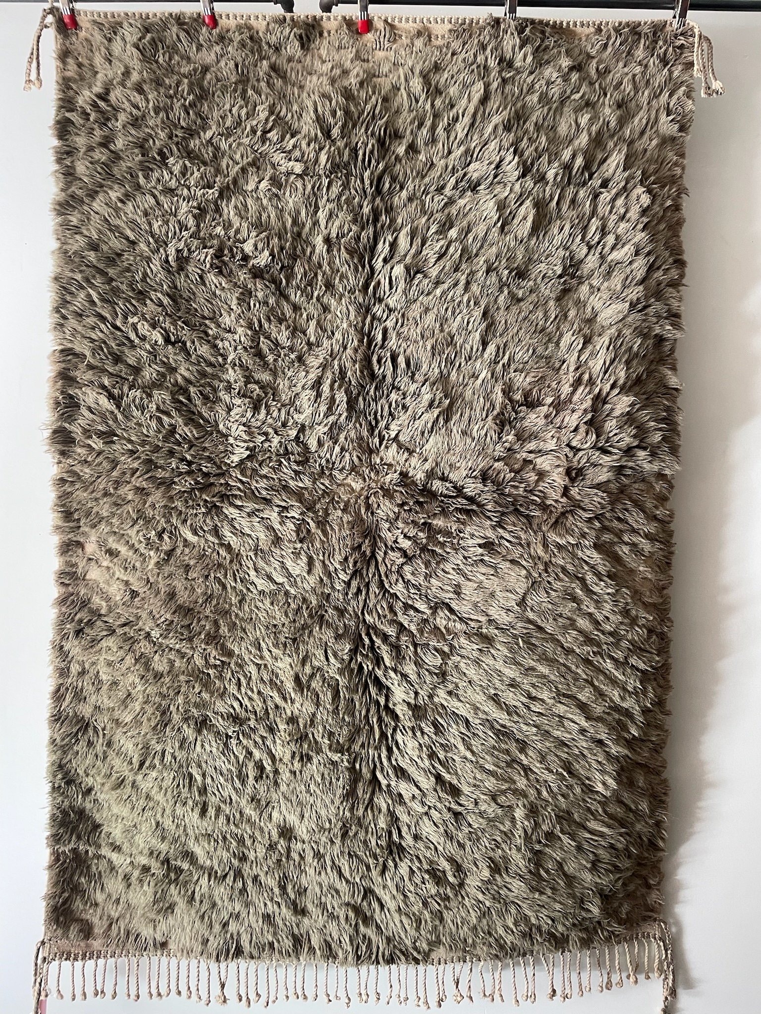 hand-knotted super shag minimal Moroccan wool rug in soft olive brown