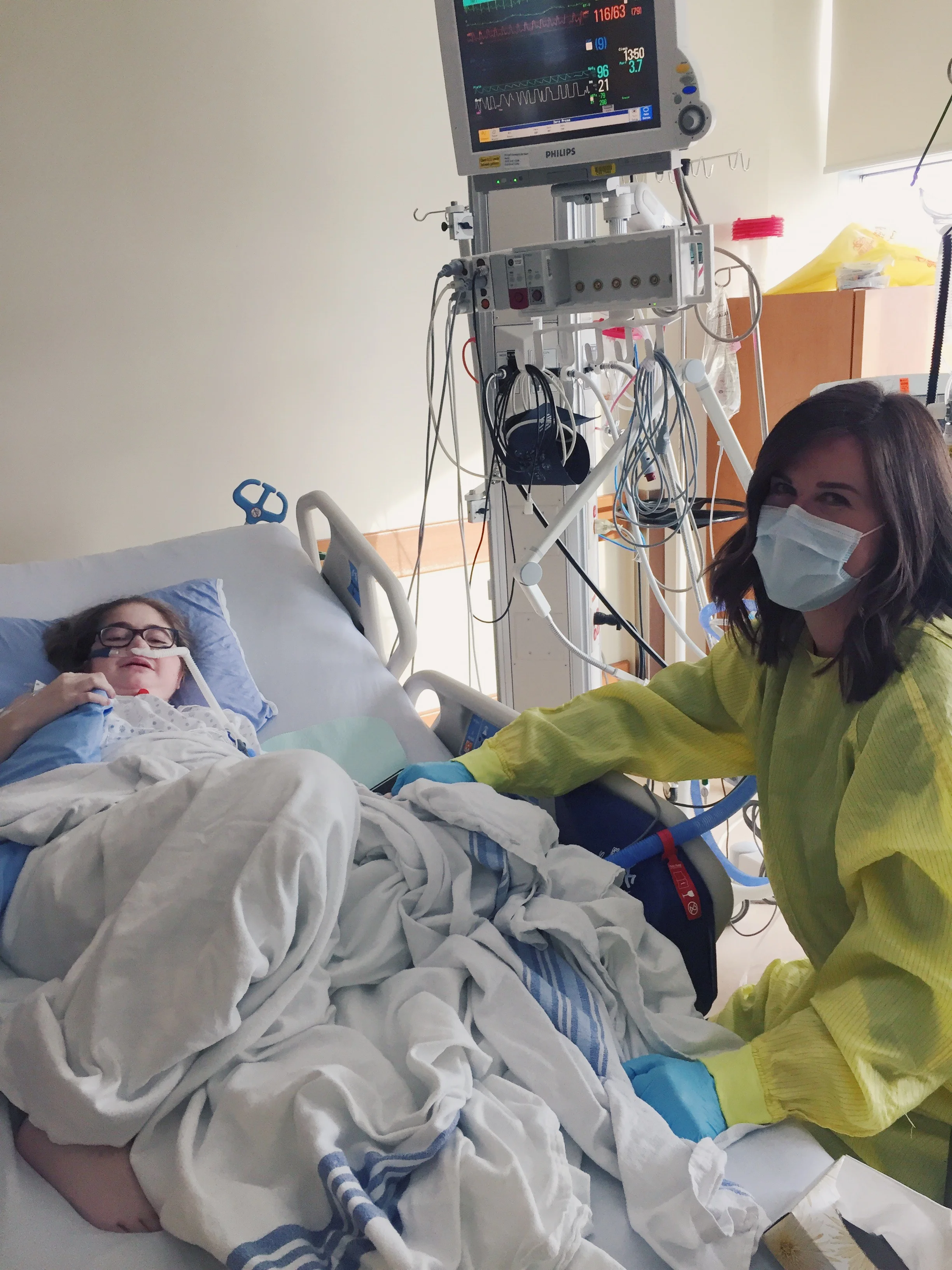 In the cardiovascular intensive care unit, holding hands. 