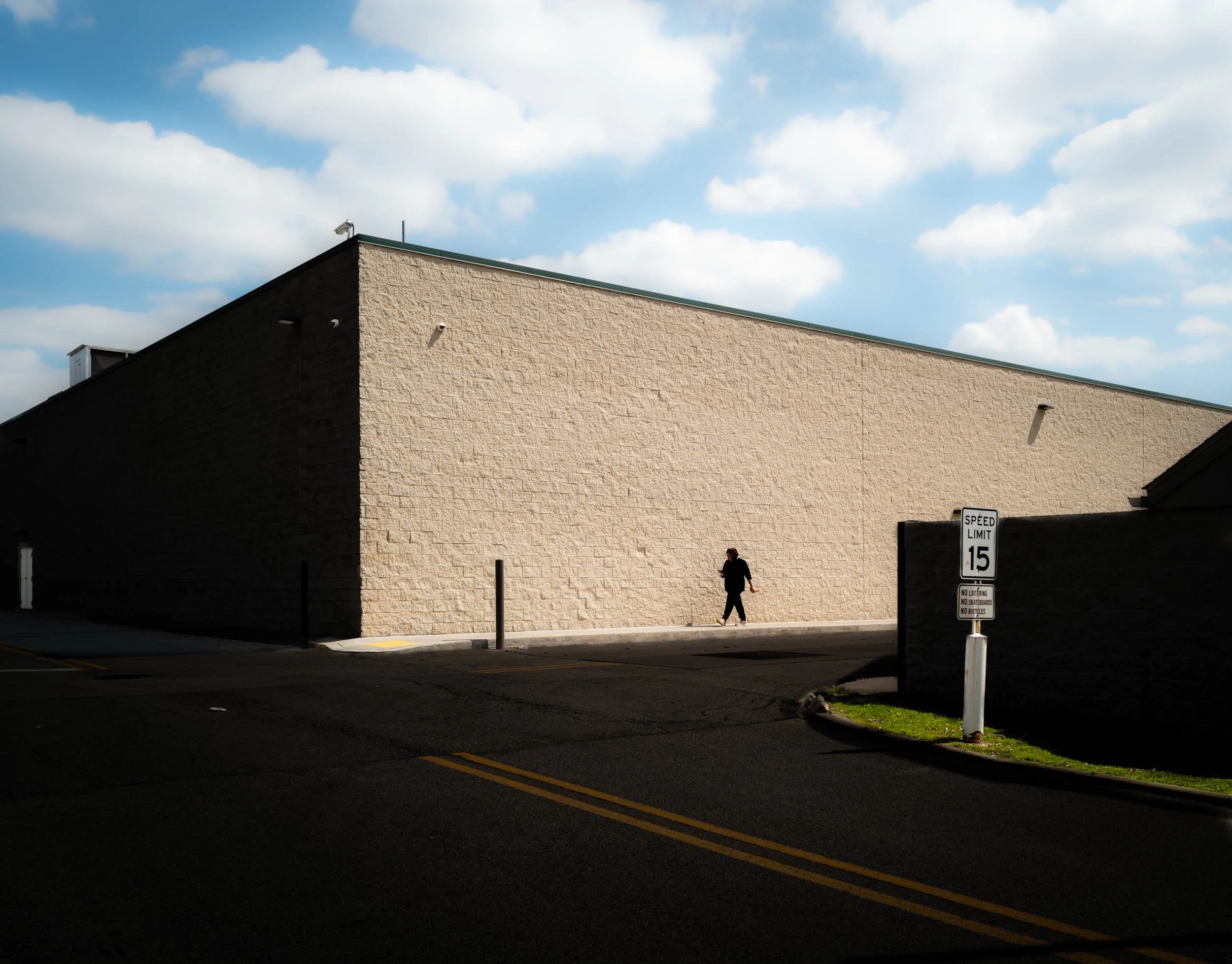 Latina woman walking with concern at shopping center
