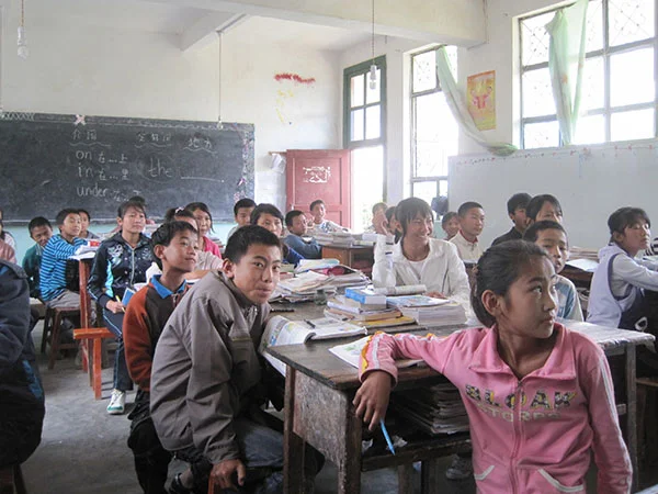 Some of my 50 seventh grade students in their classroom.