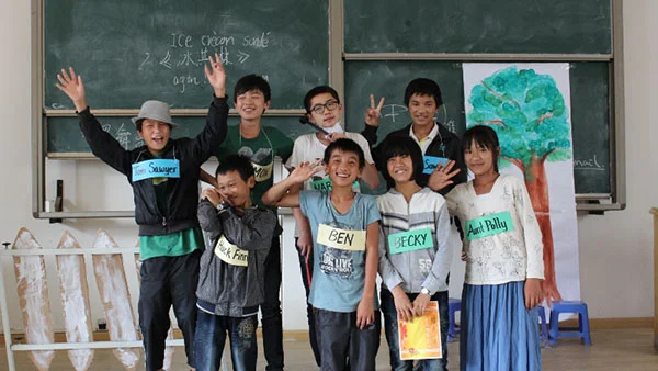 Students rehearsing the play Tom Sawyer.