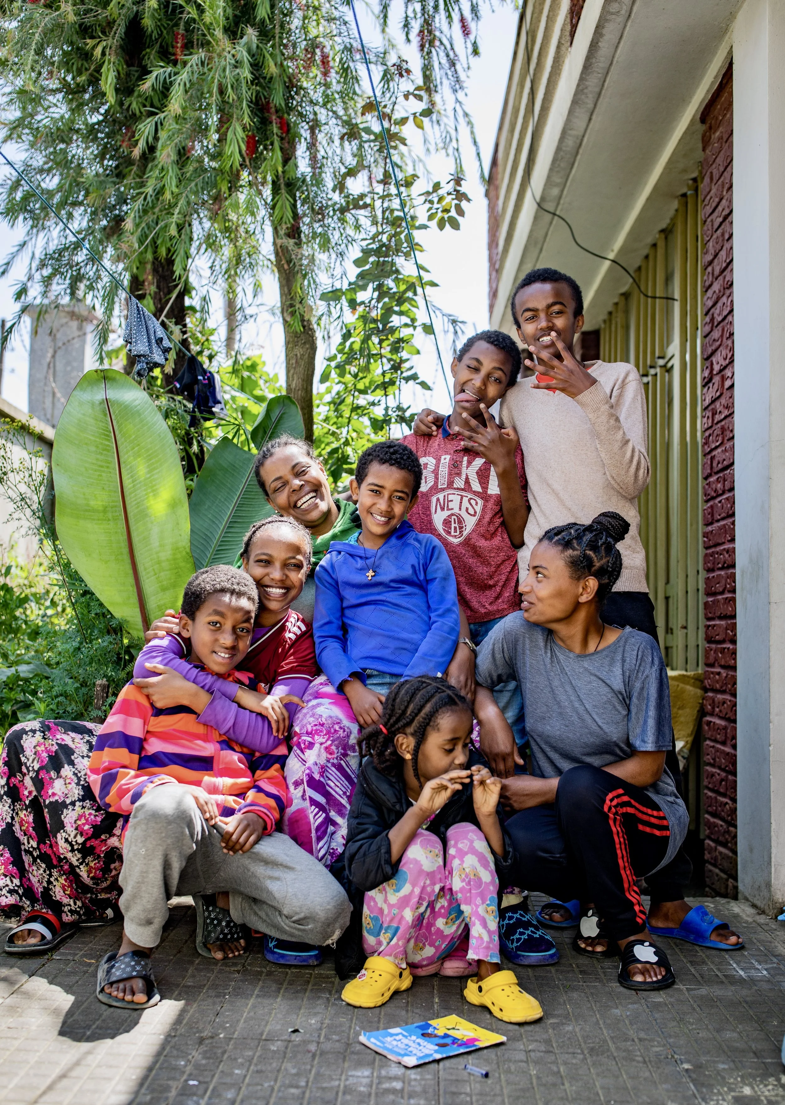 Mama Aster surrounded by several of her kids. There’s so much love at Bale house!