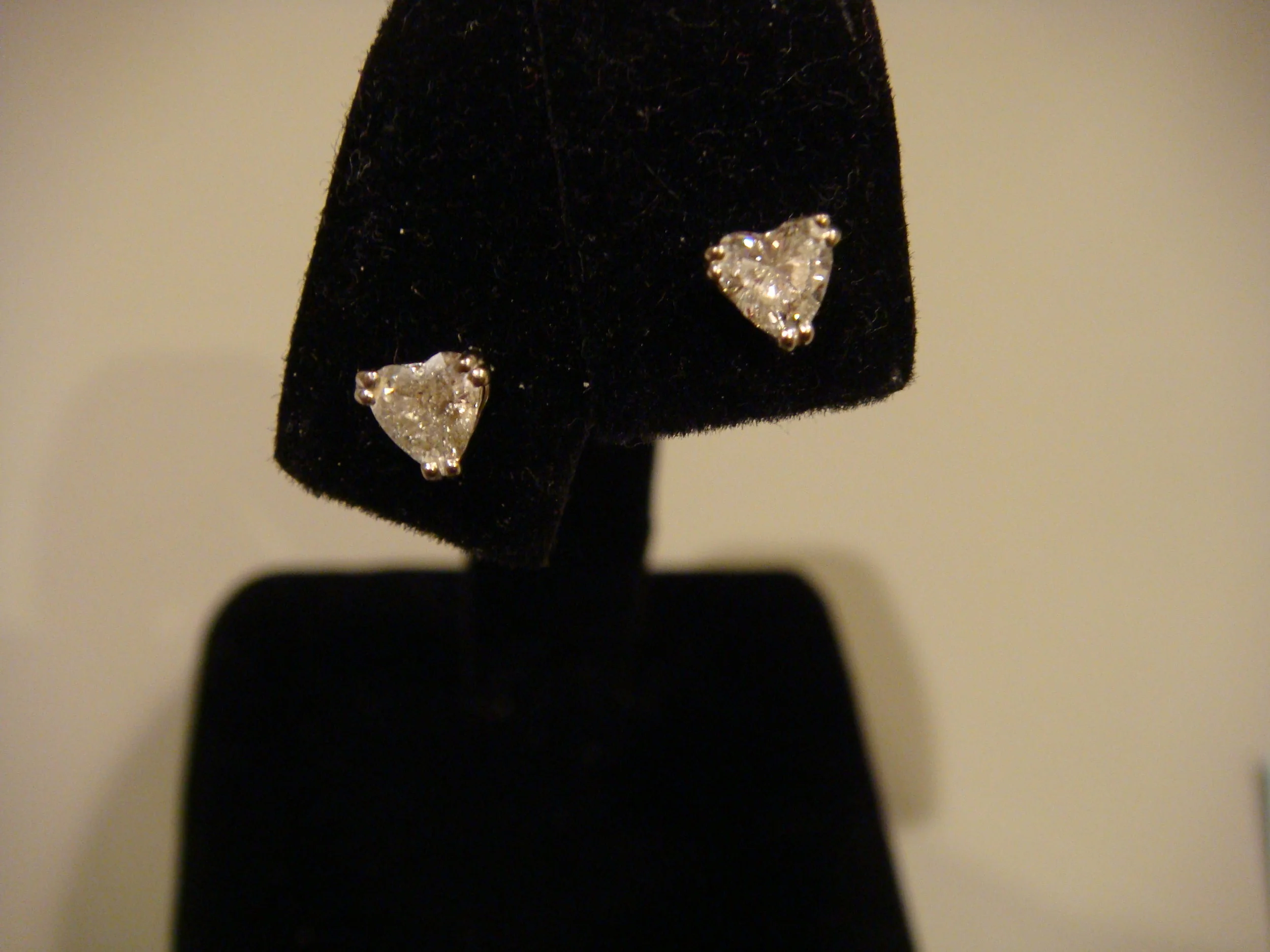 Pair heart shaped diamond studs .25 c each 14k gold