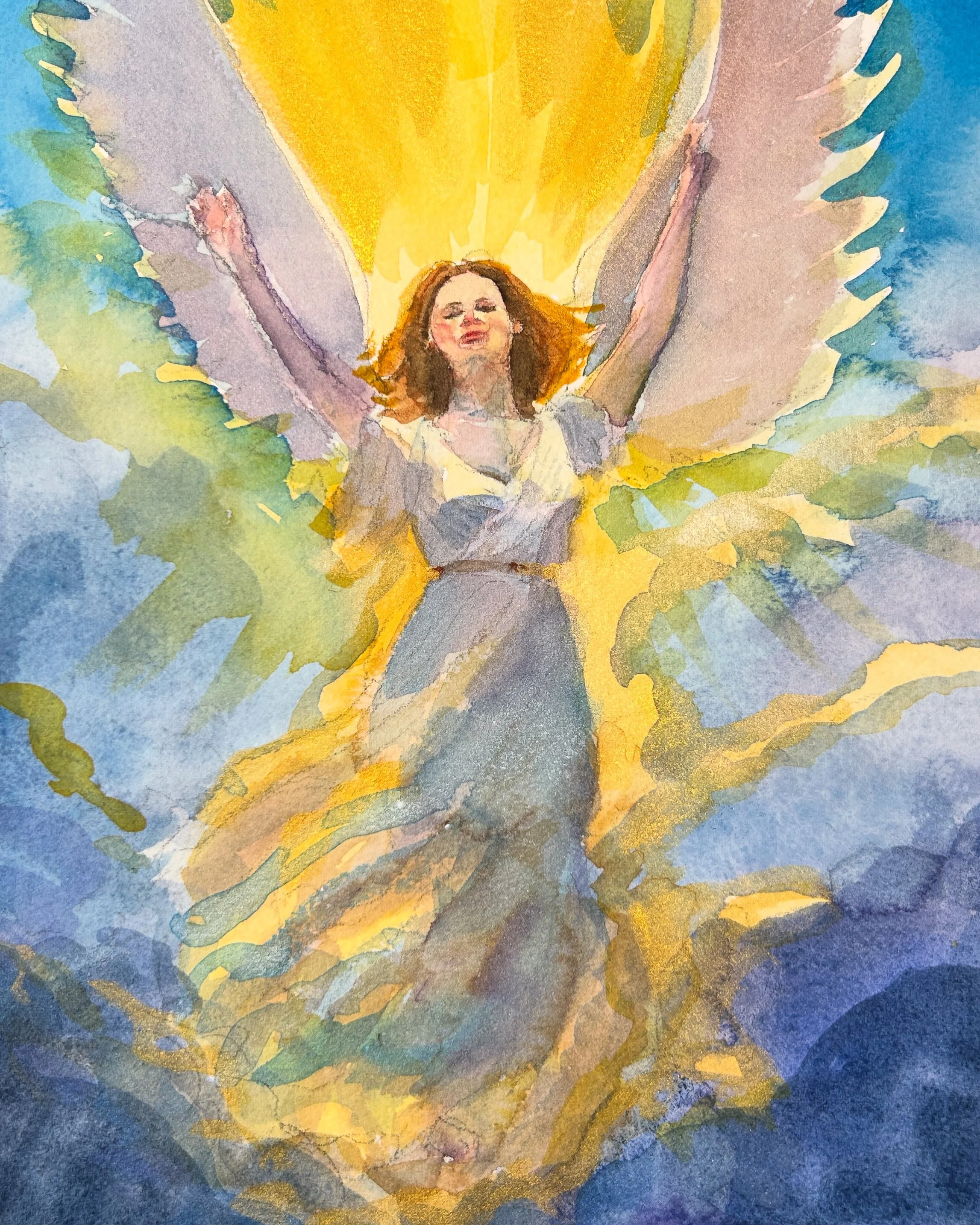 Kat Logan sharing spiritual artwork and readings at the Holistic Fair in Augusta