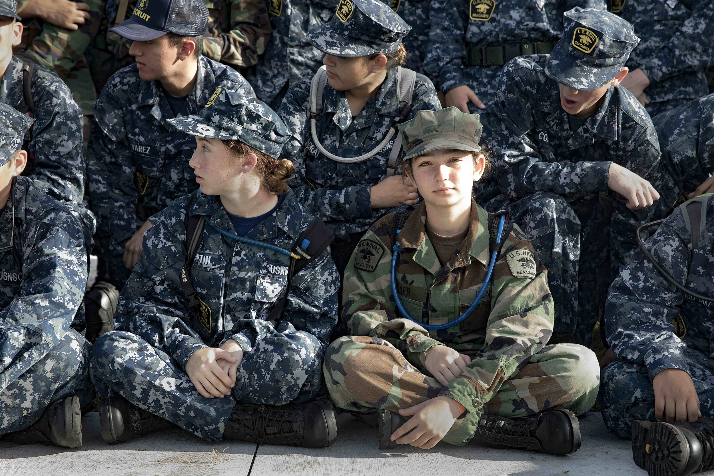  U.S. Naval Sea Cadet Corps Seaman Recruit Terner, Palm Beach Division, waits for her shipmates to get settled for a group photo. Cadets are not required to join the armed services upon graduation; however, when they do, According to former Chief of 