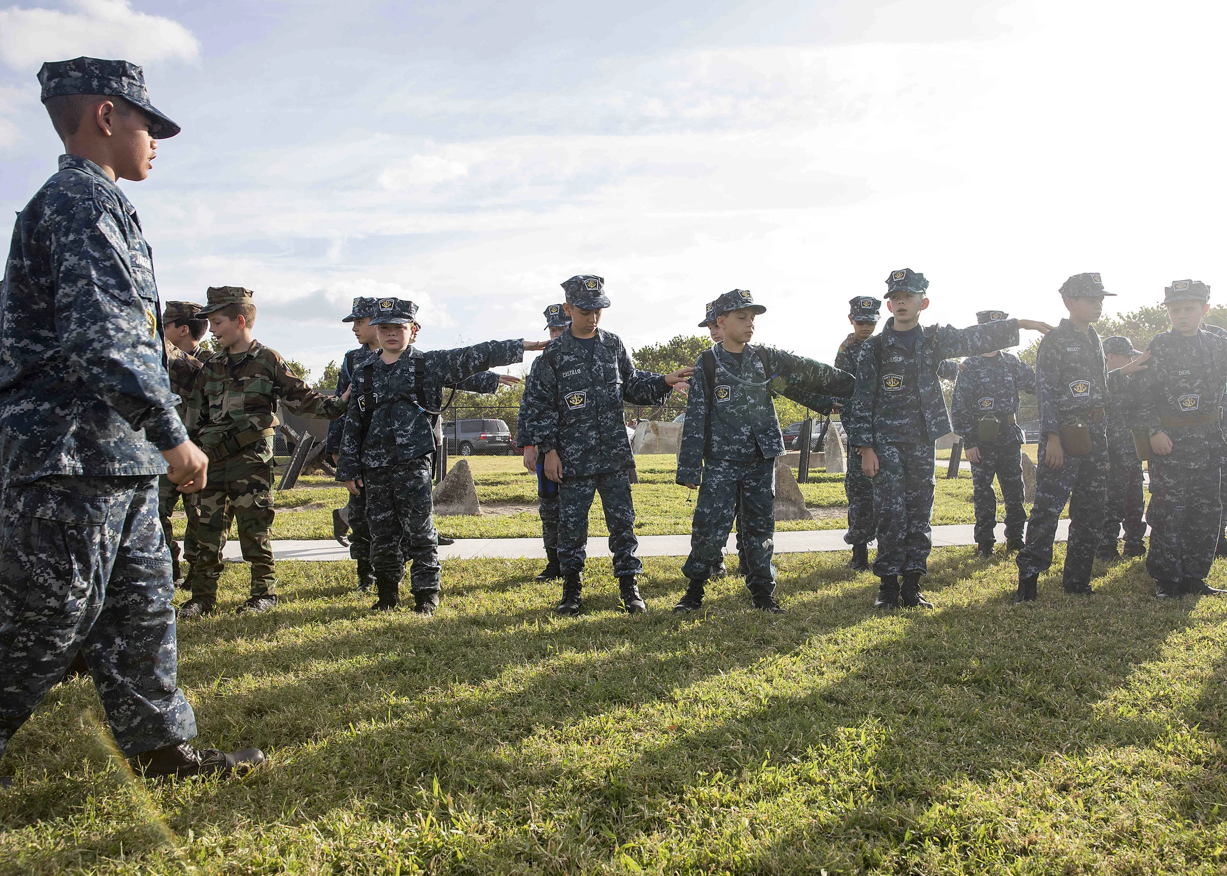  U.S. Naval Sea Cadets "dress left" to align themselves in formation.&nbsp; 