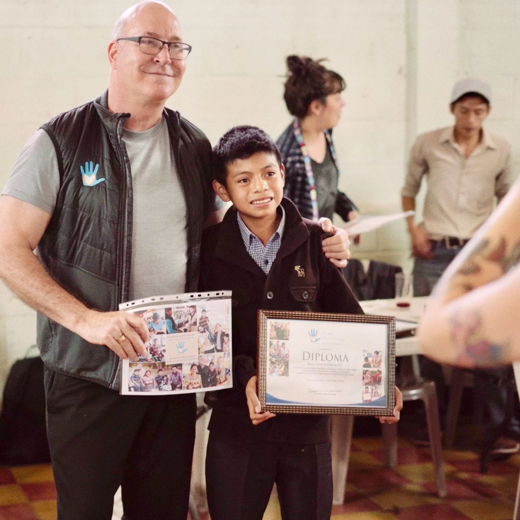 Brian with Diploma Screenshot SQ.jpeg