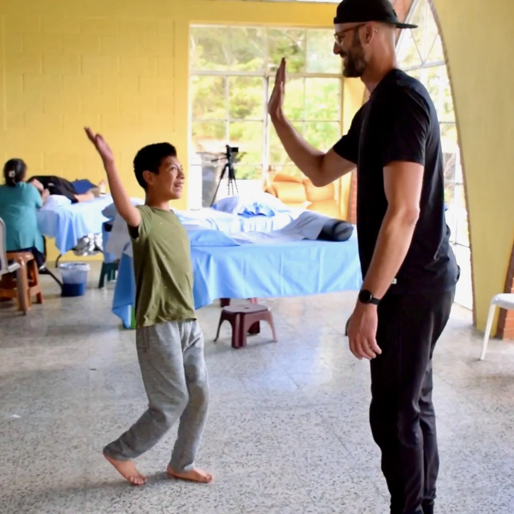 Jason and Felipe-13 high-five, SQ.jpeg