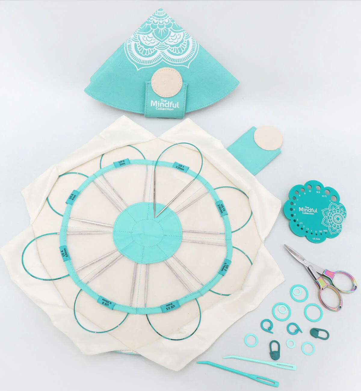 Set of 8 metal 9" circular knitting needles in canvas pouch with contents on display