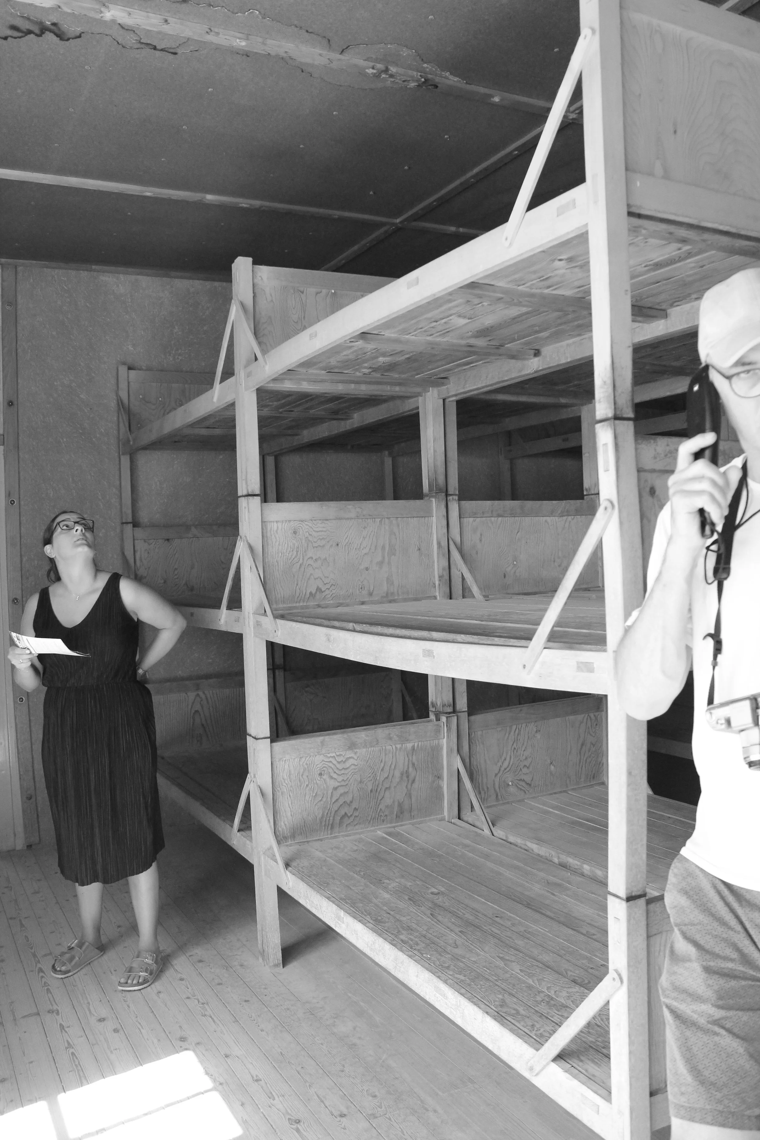 These beds were for the "middle class" prisoners. A few people would share a bed, they didn't have blankets, and they had a separate room where they would eat.