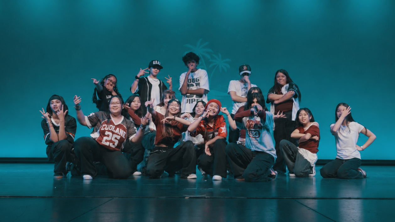 Intermediate Teen Hip Hop dancers performing advanced choreography at a re.DEFINE Dance Studio showcase.