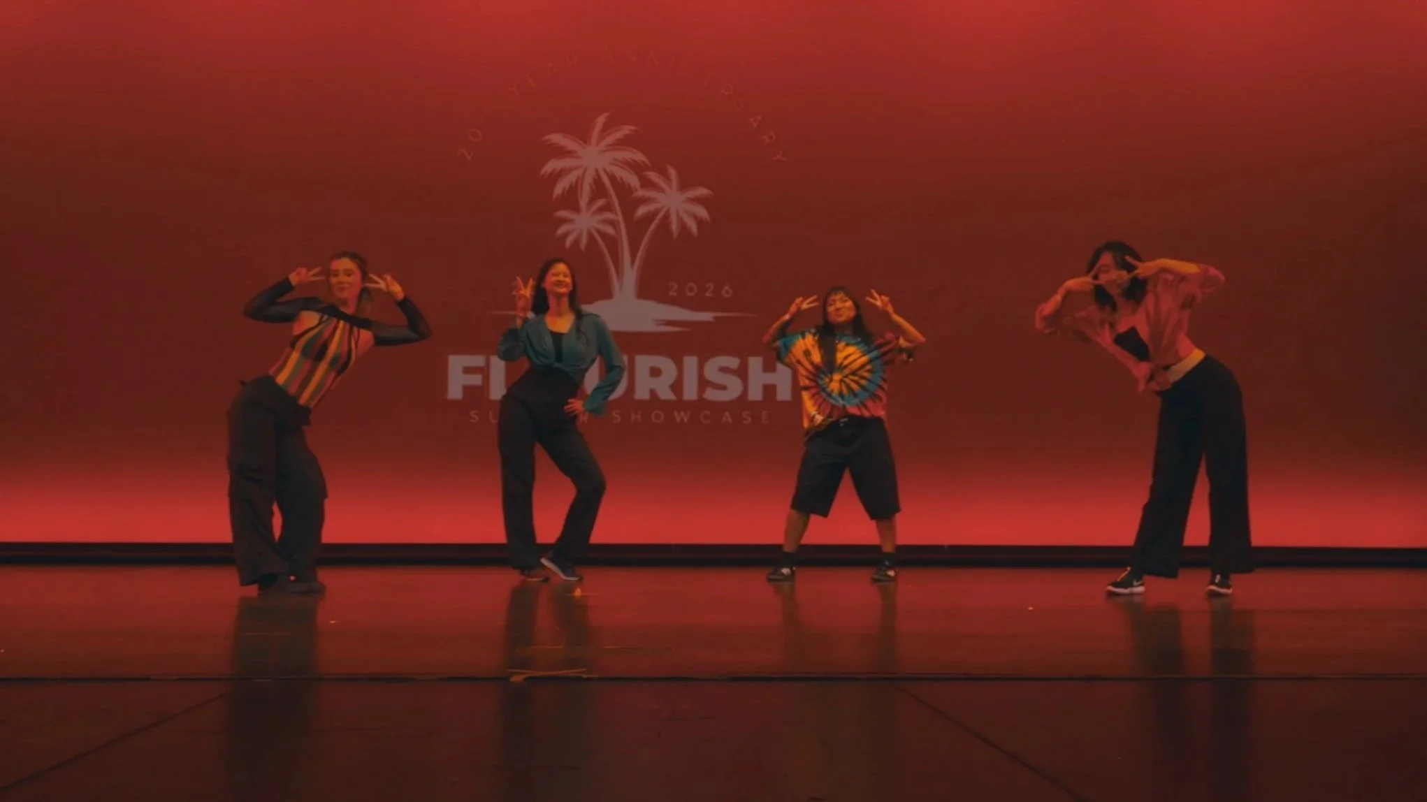 Intermediate choreography students performing hip hop choreography at a re.DEFINE Dance Studio showcase.