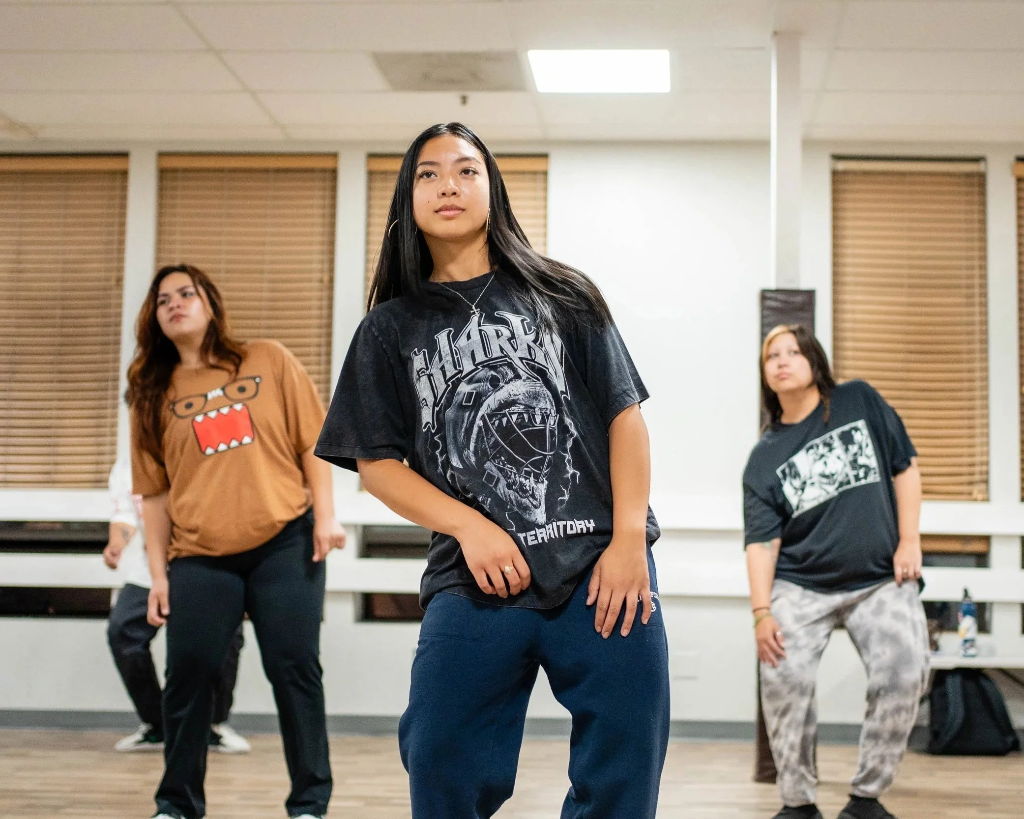Adult dancers learning choreography during a weekly hip hop dance class at re.DEFINE Dance Studio in Hayward, California.