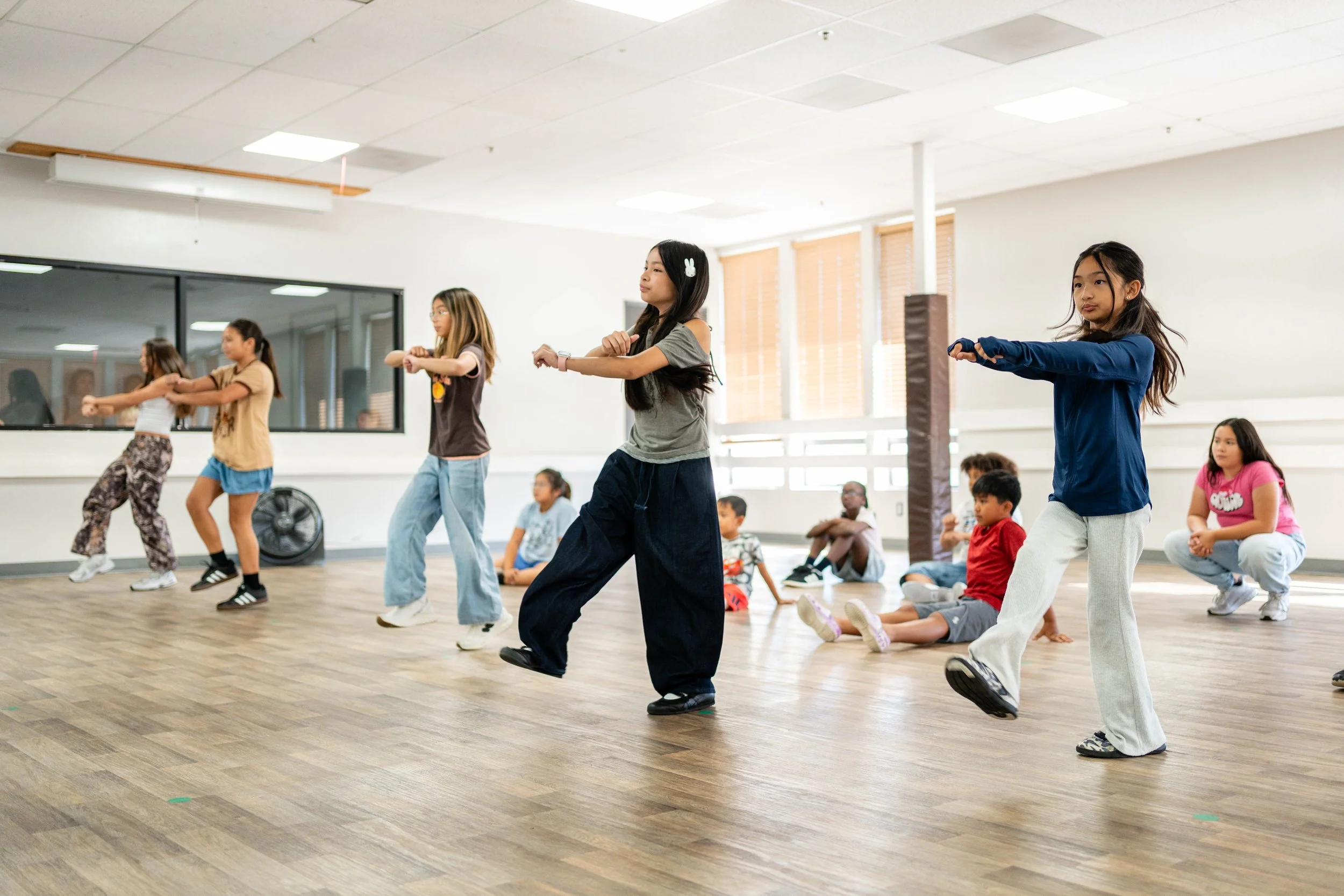 Students participating in a hip hop dance class at re.DEFINE Dance Studio in Hayward, California.