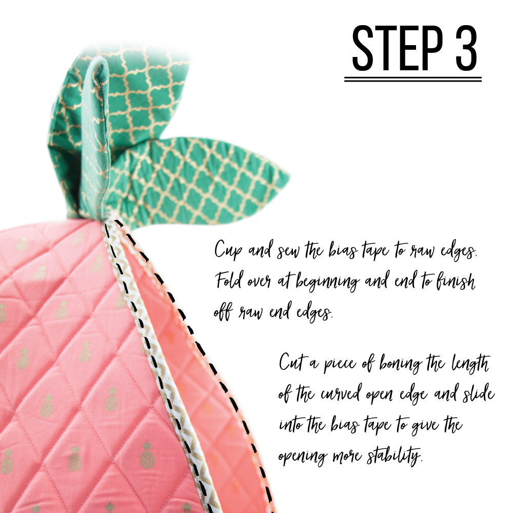 Step 3: Finish off the raw edges with Bias Tape and add Boning (To Make Double Fold Bias Tape: cut 2” wide strips of your choice of fabric. Sew the short ends together to make one long strip. You will need 90” of strip length to run along the side and bottom edge. Fold the long ends of the strip together. Press to get a center line. Unfold. Line up and fold the long edge of both sides to the middle line. Press. Fold again to center and press. ) Cup and sew the bias tape to the raw edges. Fold over at the beginning and the end to finish off raw end edges. Cut a piece of boning the length of the curved open edge and slide into the bias tape to give the opening more stability. To add even more stability consider adding an additional piece of boning along the bottom edge. The pineapple section of bed is finished.