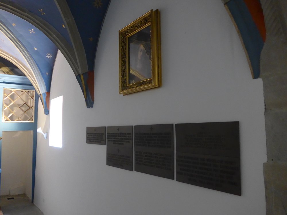 Our Lady of Bowed Head and Plaques