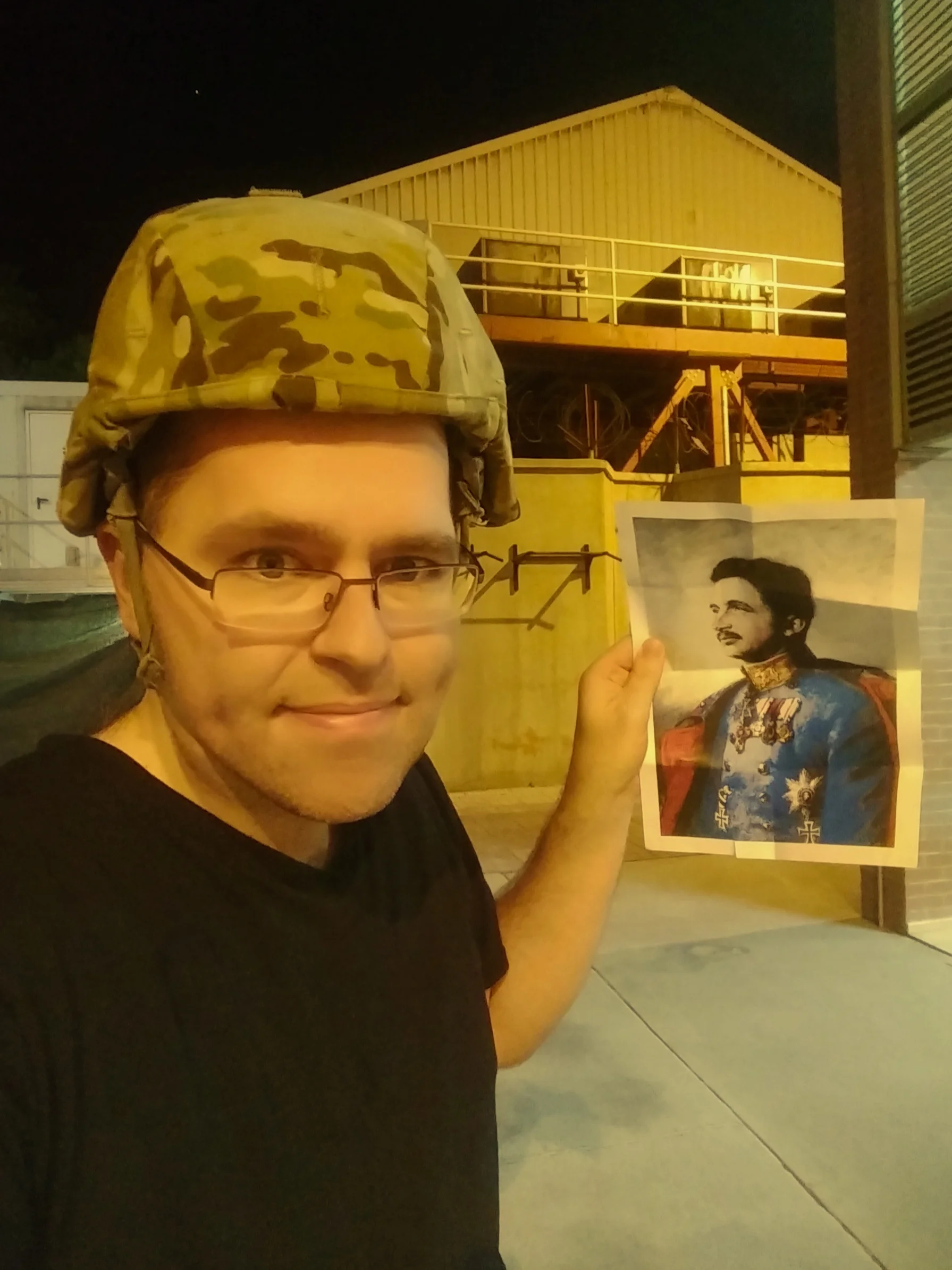 Patrick Abbott, Financial Secretary to O'Boyle Council 11302 and acting Roundtable Chairman, is shown in Kabul, Afghanistan, with his image of Blessed Karl during a recent deployment.