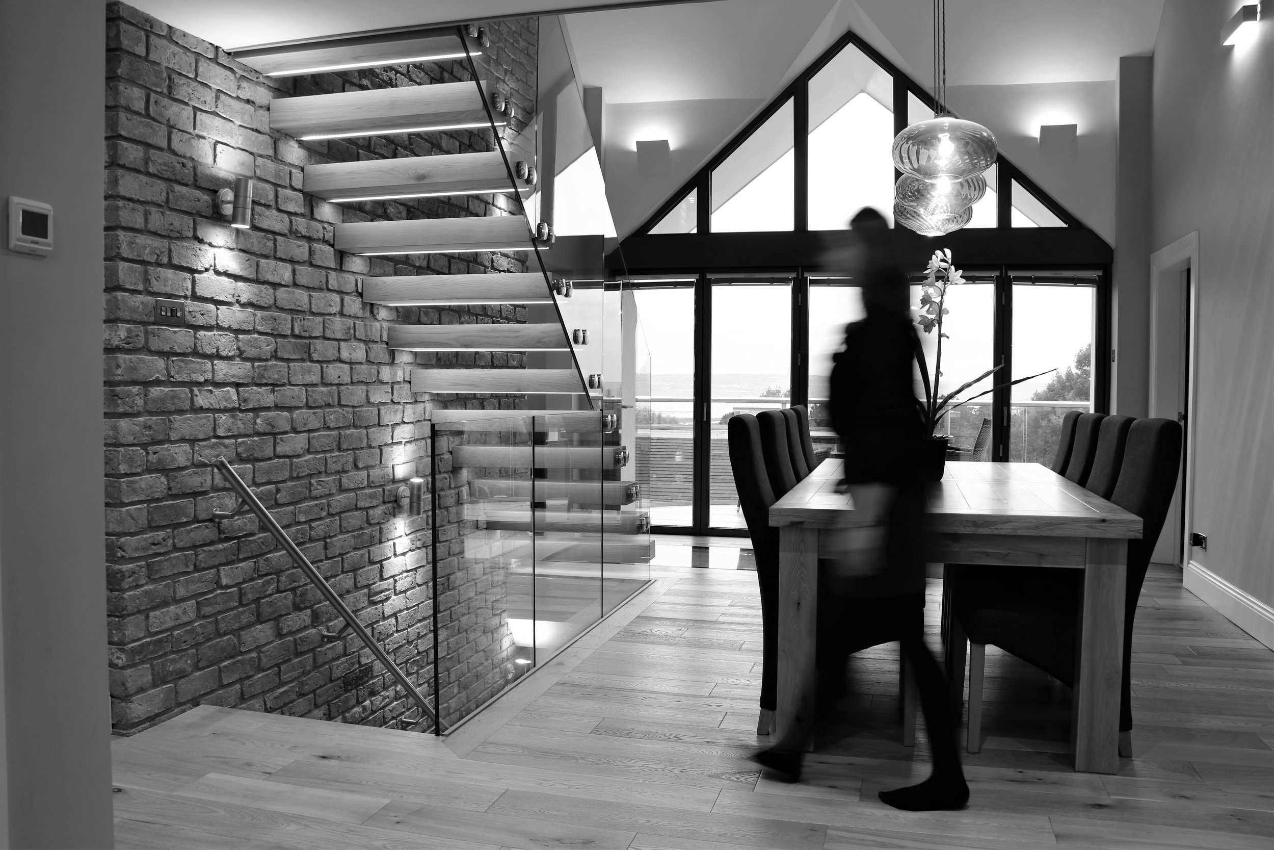  The Entrance Hall leading to an external balcony with views across the Dee Estuary. 