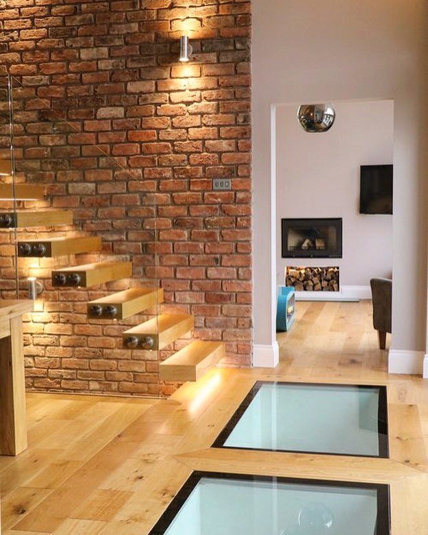 Glass floor at a project in #Heswall, #Wirral #newbuild #details #glass #staircase #brick #oak #stainlesssteel #lighting #timberfloor #design #newhome #architecture #pmoarchitects