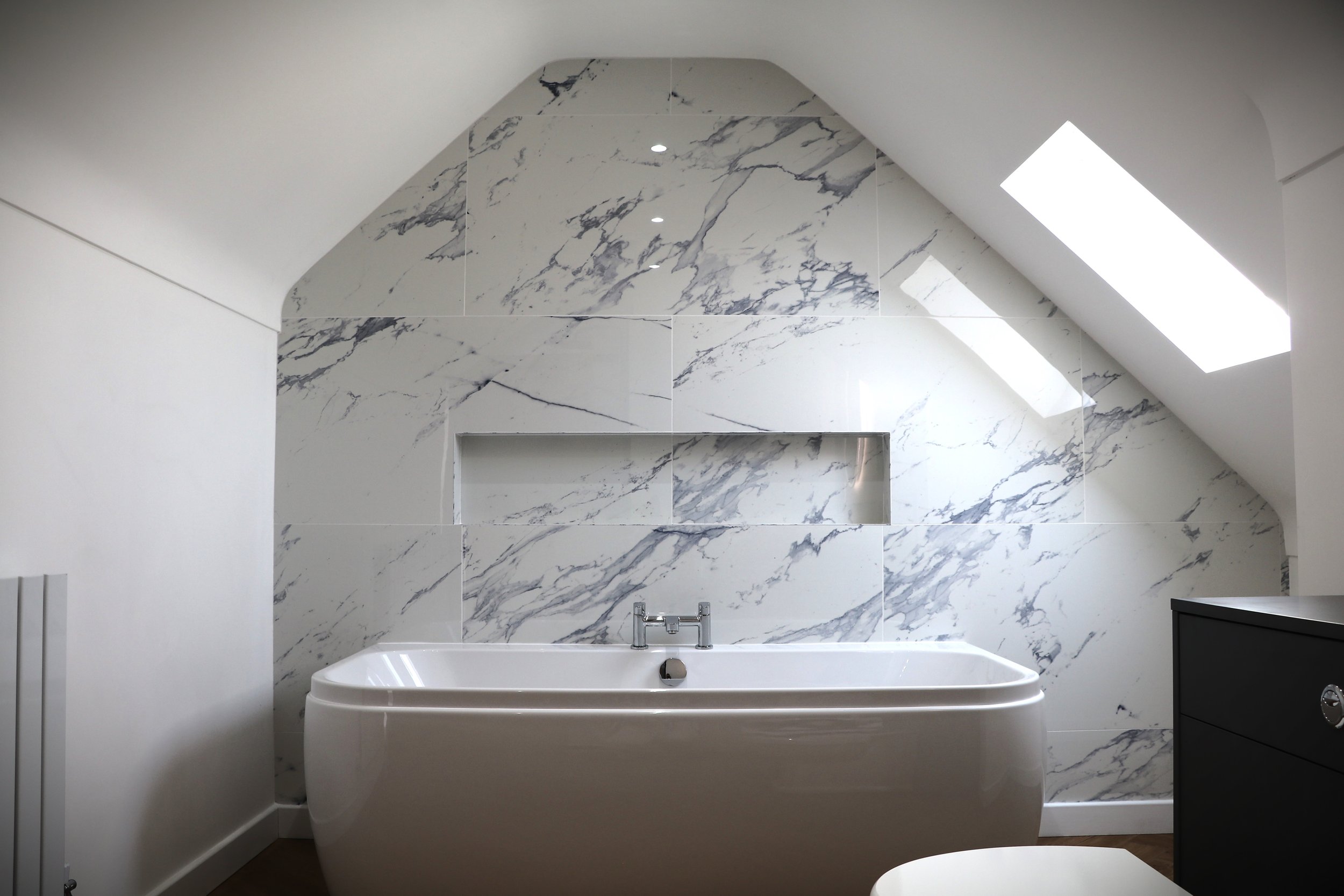  The home's high-quality finishes extend upstairs into the main bathroom, establishing a secluded, relaxing sanctuary set apart from the rest of the house. 