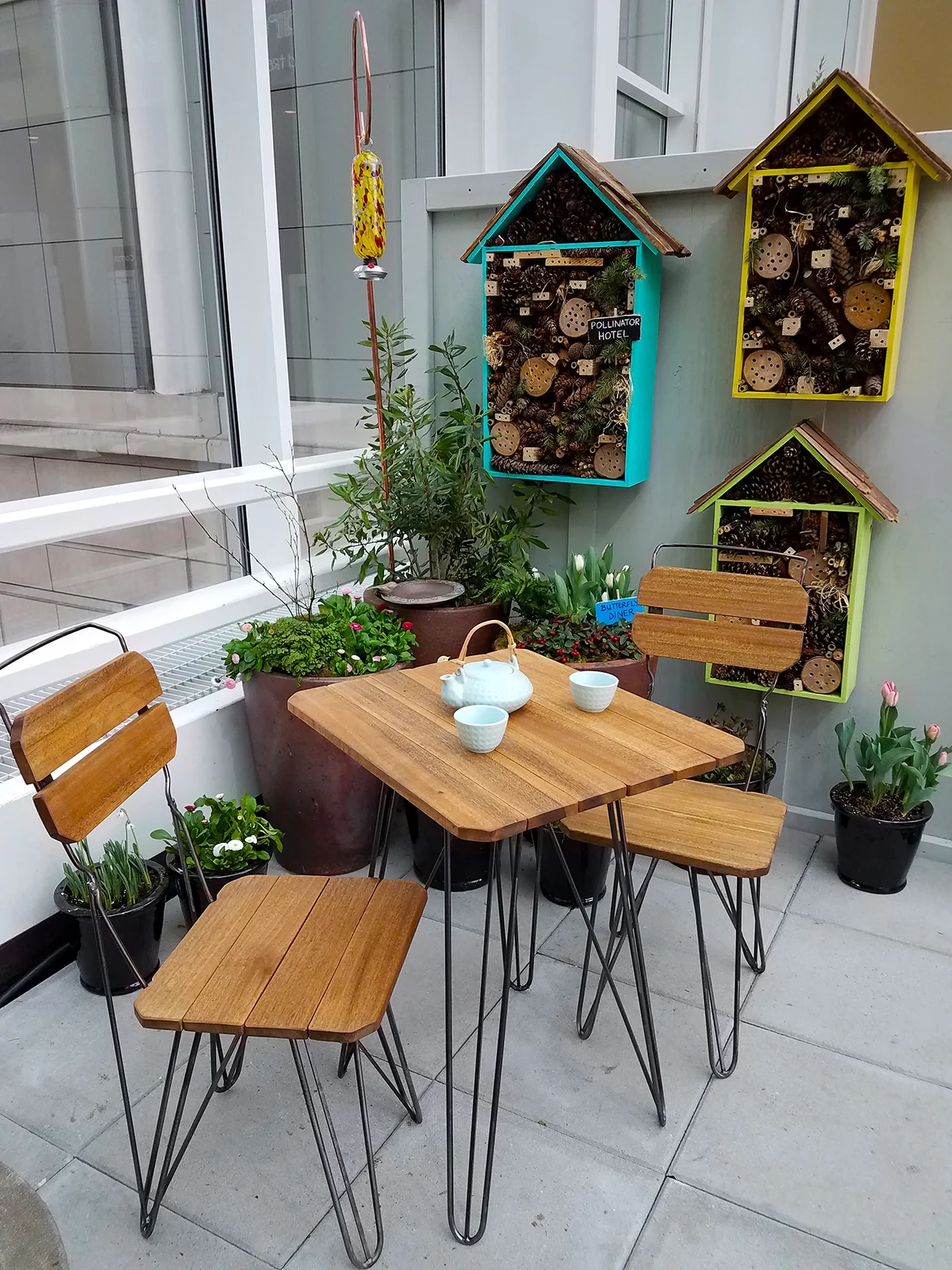 Reclaimed wood bistro set by James Taylor @ Ballard Reuse . Pollinator Hotels by IslandWood Learning Center .