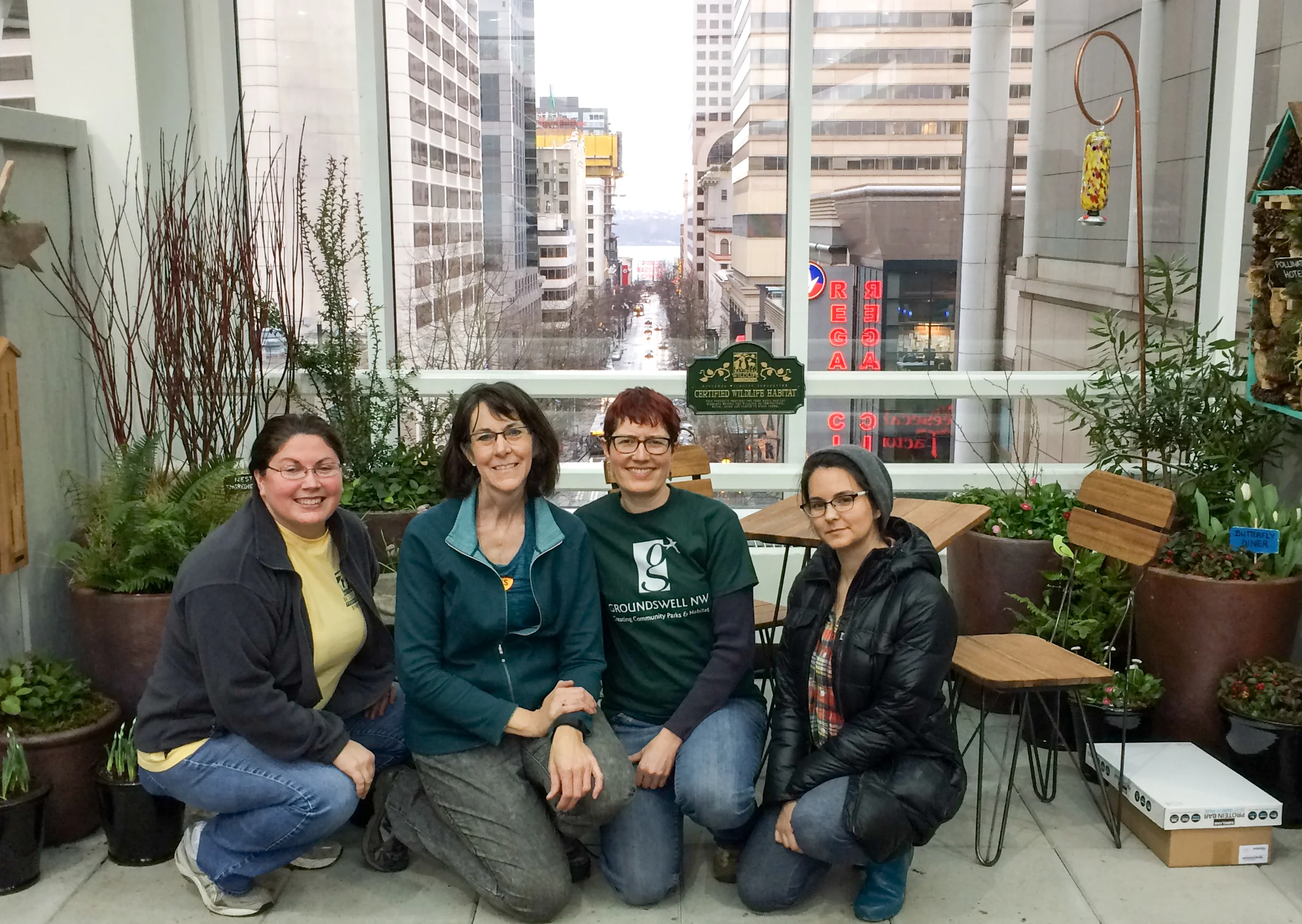 Courtney, Jan, Dawn & Rachel at the end of "set up day", NW Flower & Garden Show. Set up volunteers not pictured: Kaitlin, Mark and Daniel. Thank-you!