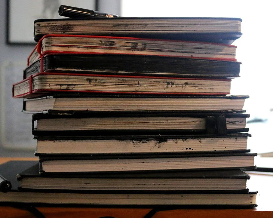Pile of sketchbooks2.jpg