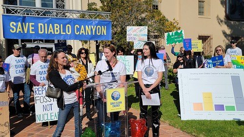 Kristin, Heather, Izzy, speaking at Save Clean Energy rally.jpeg