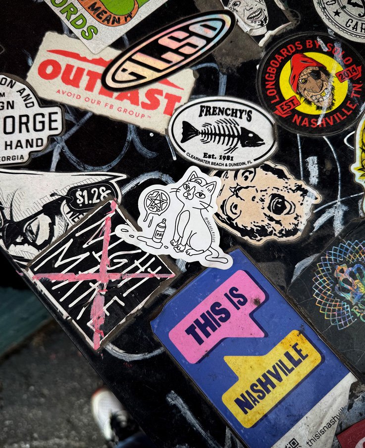 pentakitty sticker in the wild_web.jpg