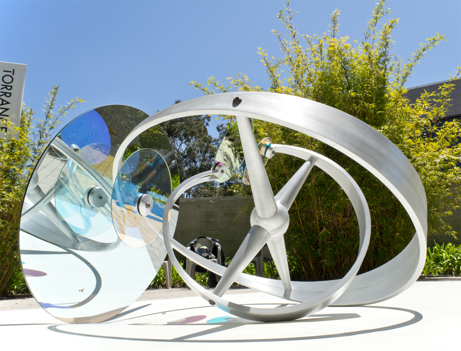 Active Measure 9, 2018, aluminum, dichroic glass, rubber, steel, 32”h x 42”w x 36”d